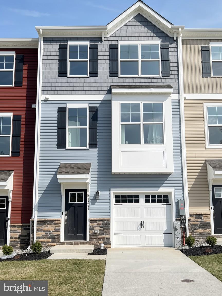 PRICE REDUCTION – QUICK MOVE-IN OPPORTUNITY!

Welcome to The Abigail, a beautifully designed one-car garage townhome offering space in all the right places. This thoughtfully crafted floor plan features three spacious bedrooms, three full baths, and a convenient powder room, delivering comfort and flexibility for modern living.

The main level boasts an open, light-filled layout perfect for both everyday living and entertaining. The oversized kitchen island serves as the centerpiece of the home, seamlessly connecting to the expansive great room and separate dining area. Step outside to enjoy the 16' x 10' rear deck—ideal for relaxing or hosting guests.

Upstairs, the bedroom level includes a generously sized owner’s suite with a private bath, along with two additional bedrooms and a full hall bath. The conveniently located laundry area on this level adds everyday ease rarely found in townhome living.

The finished lower level expands your living space with a versatile recreation room and an additional full bath—perfect for guests, a home office, or entertainment space.

With its smart design, included features, and unbeatable value, The Abigail truly has something for everyone.