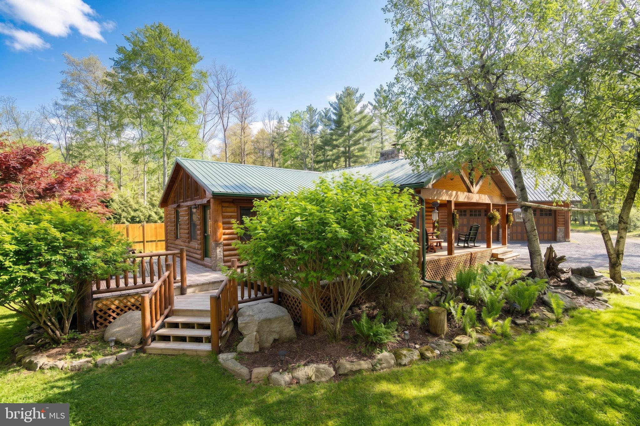 You won't want to leave this charming Log Home property located at Harvey's Peninsula. The dedicated assigned boat slip brings true Lake living to reality. One Level living and covered front deck add to the comfort of this property. The 3 Br Floor plan offers a Primary Master Bedroom Suite with Bath. The open living area features Cathedral Wood ceilings, with separate dining and custom kitchen. Lots of storage and expansion in the 24 x 32 Detached garage plus storage shed. Equipped with Generator.  You'll love the peaceful neighborhood and won't want to leave. Call today for your private tour.