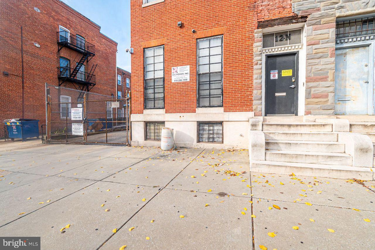 Unlock the potential of 12 N. Carey Street, a spacious multi-use commercial building perfect for investors, community organizations, or small business owners looking to expand. Step inside this charming historic property and discover multiple, large office and meeting rooms, a reception area, conference space, kitchenette, and private offices—ideal for professional services, behavioral health programs, nonprofit organizations, or training centers. High ceilings, recessed lighting, and detailed millwork preserve the building’s character while providing modern functionality. The property features updated systems, secure entry access, ample storage, and a basement area with mechanical and workspace zones. Original hardwood staircases and wide hallways offer a bright, welcoming layout that can easily be customized for your vision. Located minutes from Downtown Baltimore, the University of Maryland school and hospital, MLK Blvd, and Route 40. This property offers excellent commuter access and neighborhood visibility. Perfect for behavioral health offices, community programs, real estate, law firms, or business incubation The building has the size and structure to support a variety of professional and community-based operations. Key Highlights: Sold As-Is. Bring your vision and creativity. Ideal for nonprofits, behavioral health services, or office use. Spacious layout with conference, office, and reception areas. Updated HVAC & electrical systems. Kitchenette, restrooms, and basement storage. Classic architectural details throughout. Centrally located with strong accessibility. Property sits very near University of Maryland Hospital and School. Easy access to Baltimore City's night life and the Hippodrome theatre. I-95, I-395 are minutes away. Don't miss this great opportunity.
