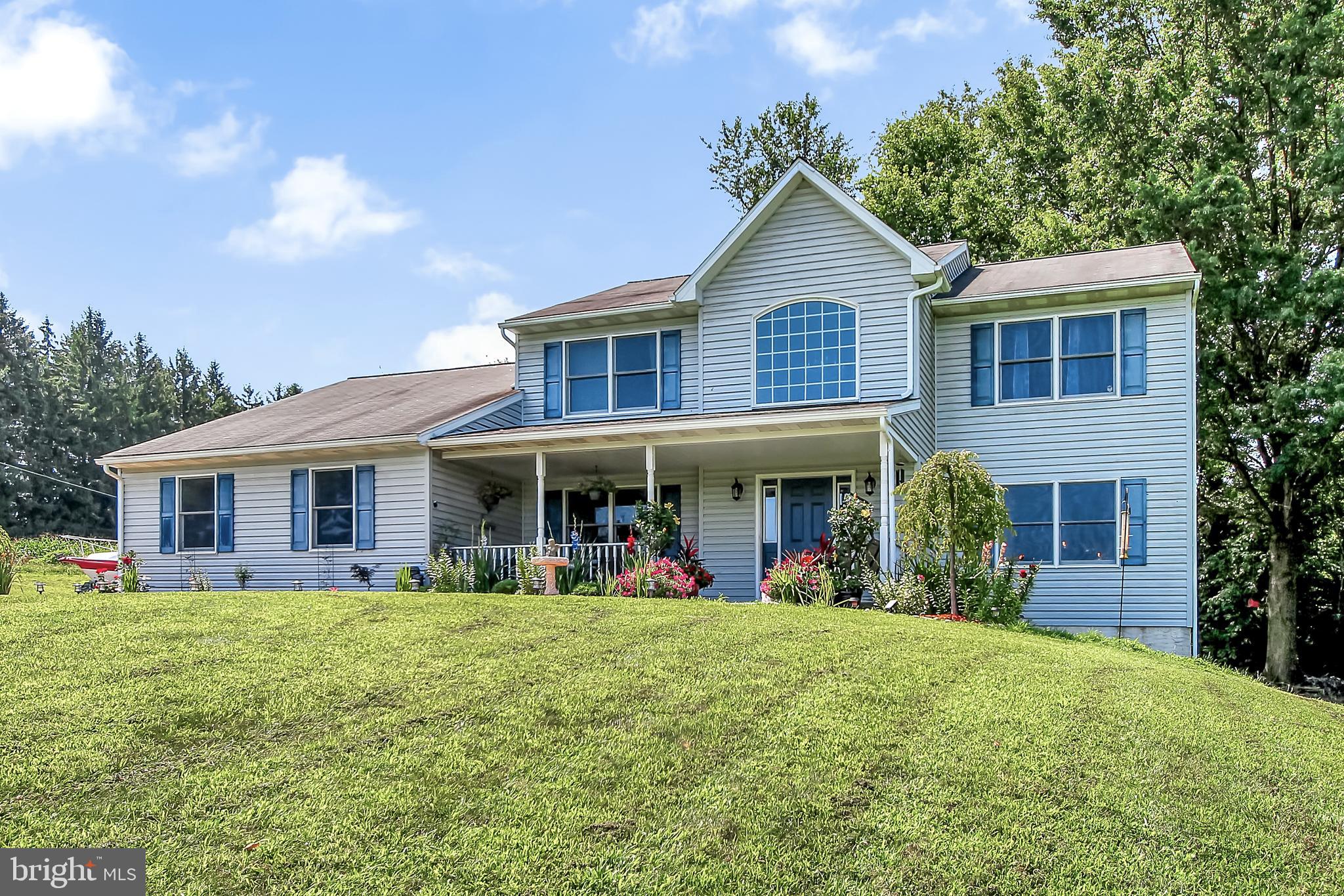 You must see this beautifully updated home in Daniel Boone School District!  Built in 2004, this great single is perfectly situated on a gorgeous 2 acre lot with plenty of privacy and amazing countryside views.  Inside, the grand two-story family room is bright and spacious and highlighted by an impressive stone accent wall with a pellet stove fireplace to keep your heating bills low.  The newly remodeled eat-in kitchen has granite countertops that include an island, stainless steel appliances, new modern lighting, and new flooring.  The large freshly painted formal dining room has picture frame molding and an elegant centerpiece light fixture. The dedicated office has room for three work stations and french glass doors for privacy. The vaulted ceiling first floor master bedroom suite has plenty of room and closet space.  A powder room and convenient laundry complete the first floor.  Upstairs there are three additional nicely-sized bedrooms, a full hallway bath, and a loft area.  Downstairs in the finished basement, you will find a gym area with recessed lighting and a hobby room that could serve many purposes.  And did I mention the big front porch or the side-entry garage?  Call to schedule your private showing today!  You will not be disappointed.