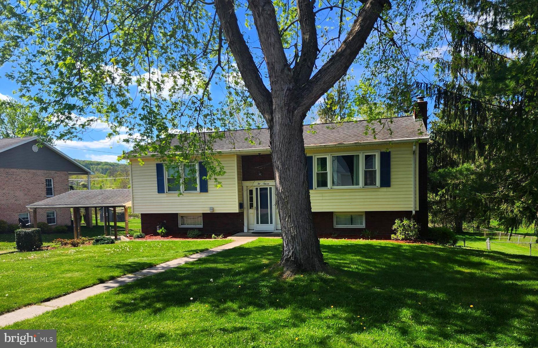 An opportunity to live in the charming university town of Frostburg, "It's just cooler here", and nestled in Mountain Side Maryland,  3 bedroom, 2  bathrooms,  separate dining, step into the rear enclosed porch, a private rear yard, a peaceful retreat, ready for entertaining, 2 car carport, lower level finished with fireplace,  close to Moutain Ridge High, sports fields and Frostburg State Univeristy, nearby to a regional medical center, GAP trail, scenic railroad, and much more.