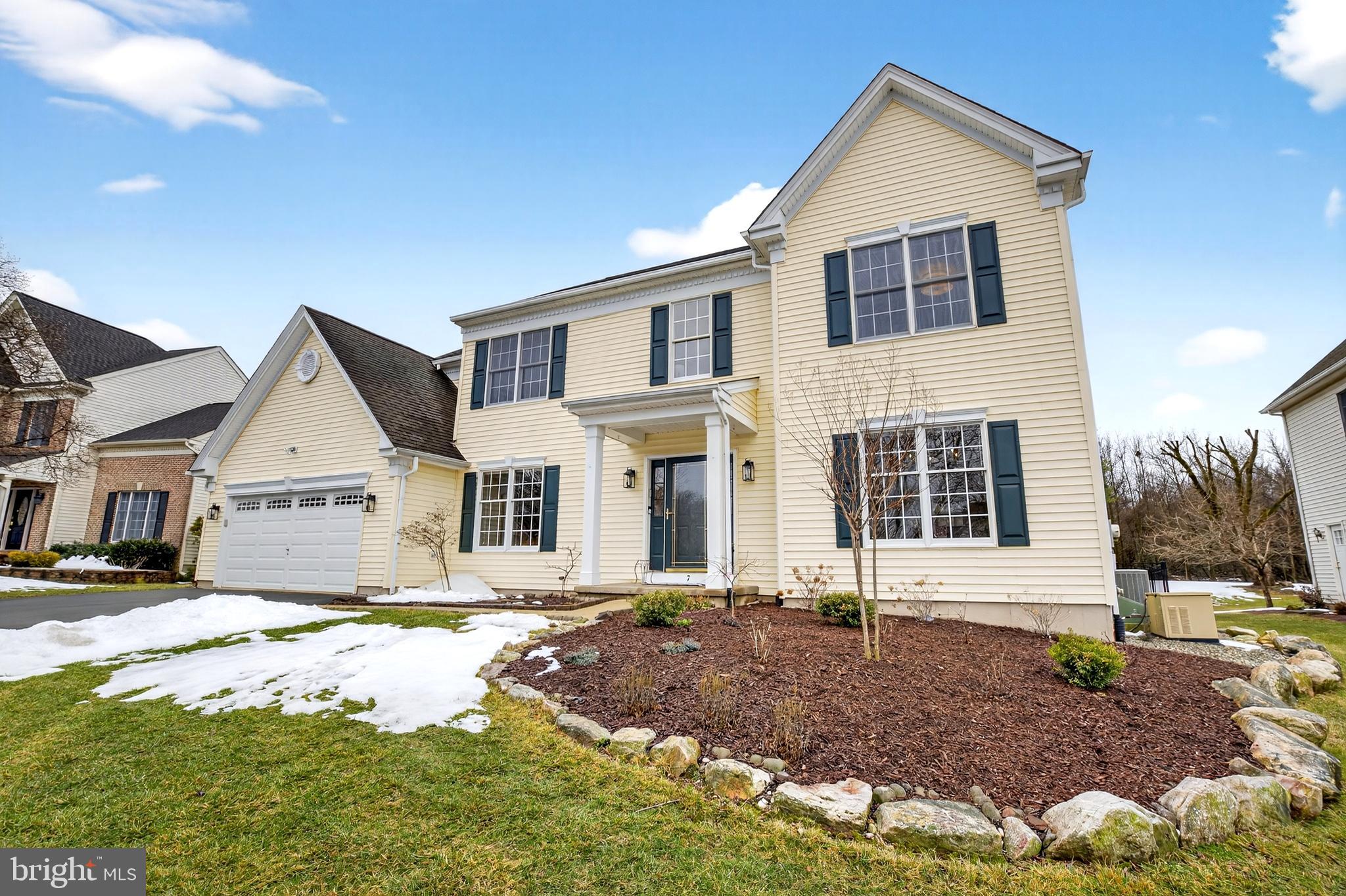 Welcome to this exceptional single family home nestled in the heart of Newtown, offering a total of over 4,000 square feet of beautifully designed living space with 4 bedrooms and 3.5 bathrooms. Backing to township preserved land, this home blends timeless architectural detail with modern comfort, while offering the privacy and natural views that are so hard to find.

The current owners often say their favorite part of the day is waking up in the primary suite and looking out the windows into the woods, watching deer meander through the trees. Mornings begin with coffee in the four season room, and on colder days, in front of the dramatic floor to ceiling stone fireplace that anchors the two story great room. Brazilian teak hardwood flooring flows throughout the first level, complemented by crown molding, detailed baseboards, and a solid wood turned staircase overlooking the main living space. The craftsmanship and attention to detail are immediately felt.

The kitchen is truly the heart of this home. Spacious and thoughtfully designed, it features a large center island, solid wood cabinetry, granite countertops, stainless steel appliances, subway tile backsplash, and a walk in pantry with abundant storage. The mudroom entry with built in cubbies adds everyday organization and convenience.

Designed for both comfortable living and memorable entertaining, the kitchen, great room, dining room, and four season room flow seamlessly together. The dining room has hosted countless holiday gatherings, while warmer evenings are spent with the windows open in the four season room, listening to the birds before stepping out to the composite deck overlooking preserved land.

The finished basement adds approximately 1,000 additional square feet with a full bath, flexible living space, storage, and potential for a fifth bedroom or guest suite.

The lifestyle here is exceptional. Enjoy walkability to the Village at Newtown and McCaffrey's Food Market, along with easy access to Newtown Borough for boutique shopping and dining. Outdoor enthusiasts will appreciate the nearby bike trails, as well as close proximity to Washington Crossing Historic Park and Tyler State Park. Ideally positioned between Philadelphia and New York City, this location offers convenience for commuters while maintaining peaceful suburban surroundings. Located within the highly regarded Council Rock School District, the setting further enhances the long term value and desirability of this home.

Spacious yet cozy, elegant yet welcoming, this has been a truly special home offering refined living, natural beauty, and exceptional convenience in one of Bucks County’s most sought after communities.