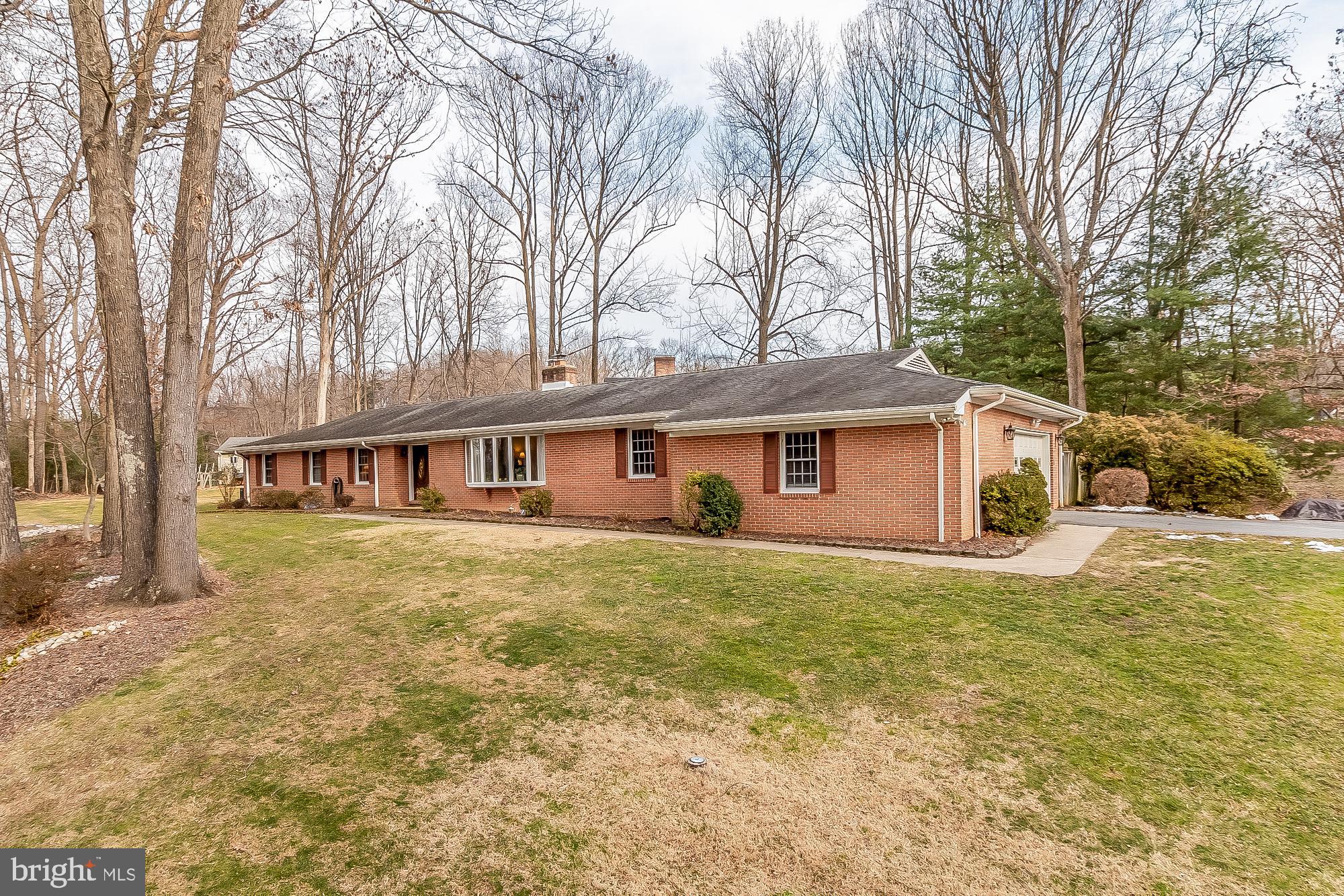 OPEN HOUSE Sat. Jan 29th and Sun. Jan. 30th from 11 am to 1 pm! Gorgeous 5 Bedroom 3 Bath Rancher with an Unbelievable In-Law Suite. If you are Looking for an Inter-Generational Home...This Is It! The Entry Level Features a Fully Renovated Kitchen with Ivory Cabinets, Stainless Steel Appliances and Granite Counters. Family Room with Wood Burning Fireplace. Large Living Room with Bay Window. A Private Home Office perfect for Telecommuting. Three Large Bedrooms with a Primary and Hall Bath. Separate Laundry Room that could be converted back to a Bedroom.  Huge 20 x 25 Sunroom with Pellet Stove, Split Heating/Cooling System, Built-in Bar and Tons of Windows Overlooking a Fully Fenced Backyard with Stamped Concrete Patio, Built-in Walkway, Fire Pit and Shed. There is Second Shed and Vegetable Garden Area Behind the Fence.  The Lower Level is Perfect for an In-Law/Au Pair Suite. Separate Entrance, Two Bedrooms, Bathroom, Fully Functioning Kitchen and Large Open Living Space with a Built-In Bar. Whole House Generac Generator.  Be in by Spring!