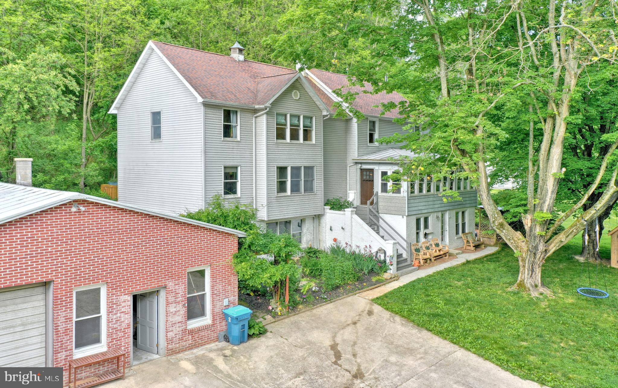 A PIECE OF HEAVEN HERE ON EARTH.   NATURE ABOUNDS ON THIS 4 ACRE HOME WITH STREAM OUT-FRONT,  AN IN GROUND POOL,   PRIVATE LOT.    FEEL OF YESTERYEAR WITH TODAY'S MODERN CONVENIENCES -HARDWOOD FLOORS, CHESTNUT SUMMER BEAMS AND SOAPSTONE WOOD STOVE TO BE FOUND IN COZY FAMILY ROOM.   2 CAR OVERSIZED GARAGE W/WORKSHOP, LOFT, ELECTRIC DETACHED GARAGE, AMENITIES TOO MANY TO LIST.  HURRY WON'T LAST!