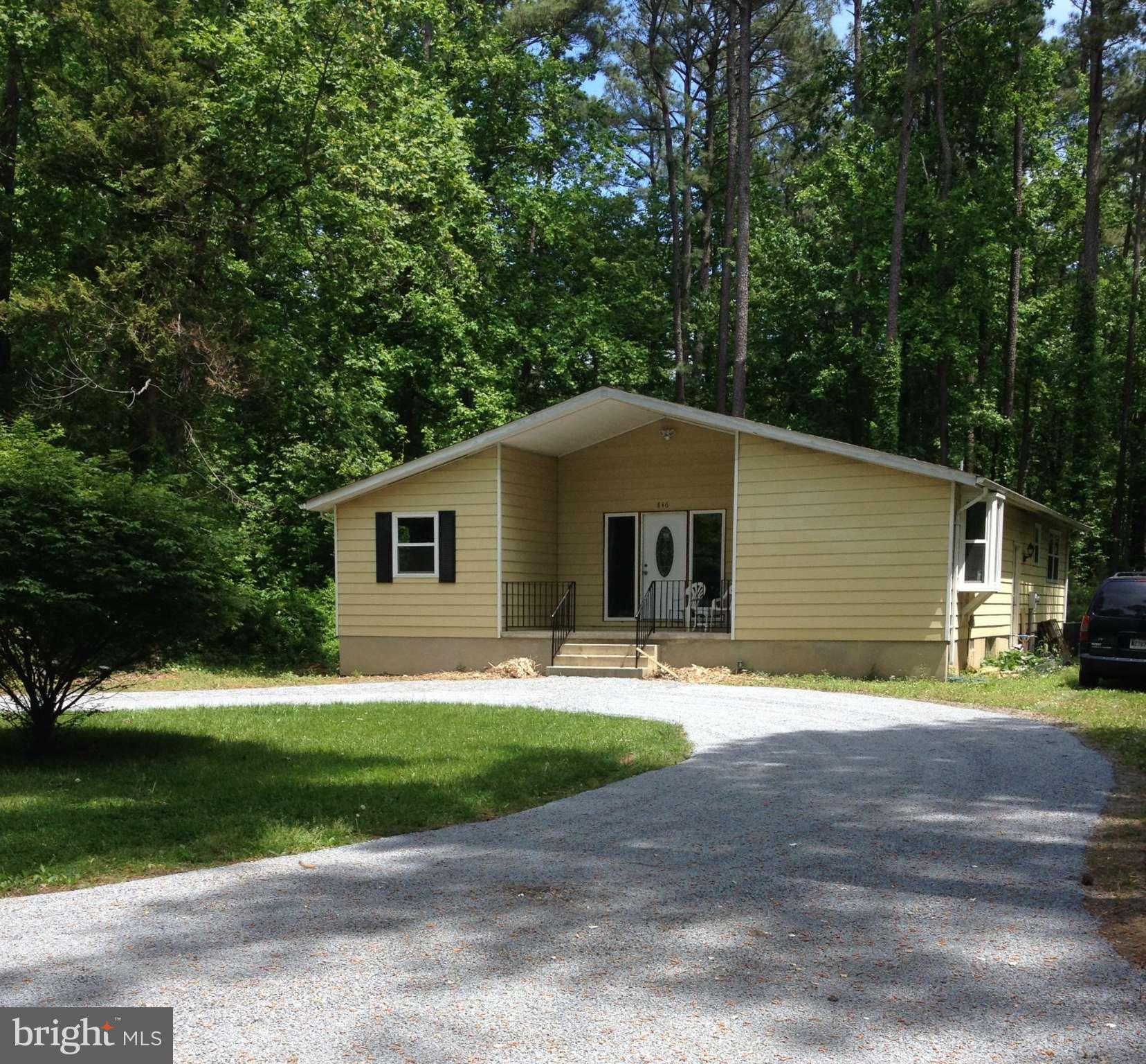 Enjoy this beautiful 4 BR, 2 BA Ranch Style 1632 sq ft home with a large Living Room, Updated Kitchen and BAs.  New roof, windows, bamboo flooring and HVACs. Must see the additional 1,020 sq ft in the basement featuring a large Entertainment area, workshop and loads of space in the laundry room.   Great wildlife activity and room to play on this almost .5 acre lot. Lead Free!  MUST SEE!