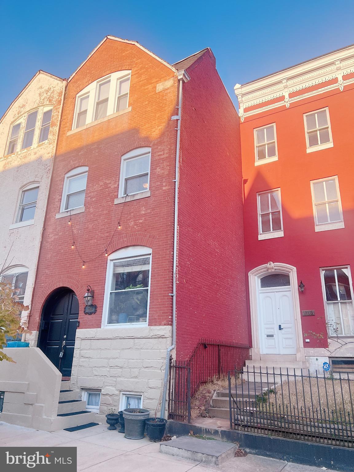 Welcome to 2263 Madison Ave!  This meticulously cared for 4 level townhome is located in the Historic Reservoir Hill area is priced very well for you to add your finishing touches and or upgrades for instant equity! Homes on the block has sold for over $450K.  Keeping with the classic charm of the neighborhood this home features, exposed brick, real hardwood flooring on 3 levels , 9+ ceilings, chandeliers, stainless steel appliances,  high-end 5 burner stove with an air fryer option, granite countertops,  new Samsung washer &  dryer with Wi-Fi capabilities, soaking tub,  glass tiles, lower level entertaining space , private outdoor oasis complete with lounge chairs, dining table and a barbecue grill.   With the purchase of this home, you will receive a 1-year Home Warranty and a 20-year Manufacturer's Warranty on the New 2024 TPO roof.