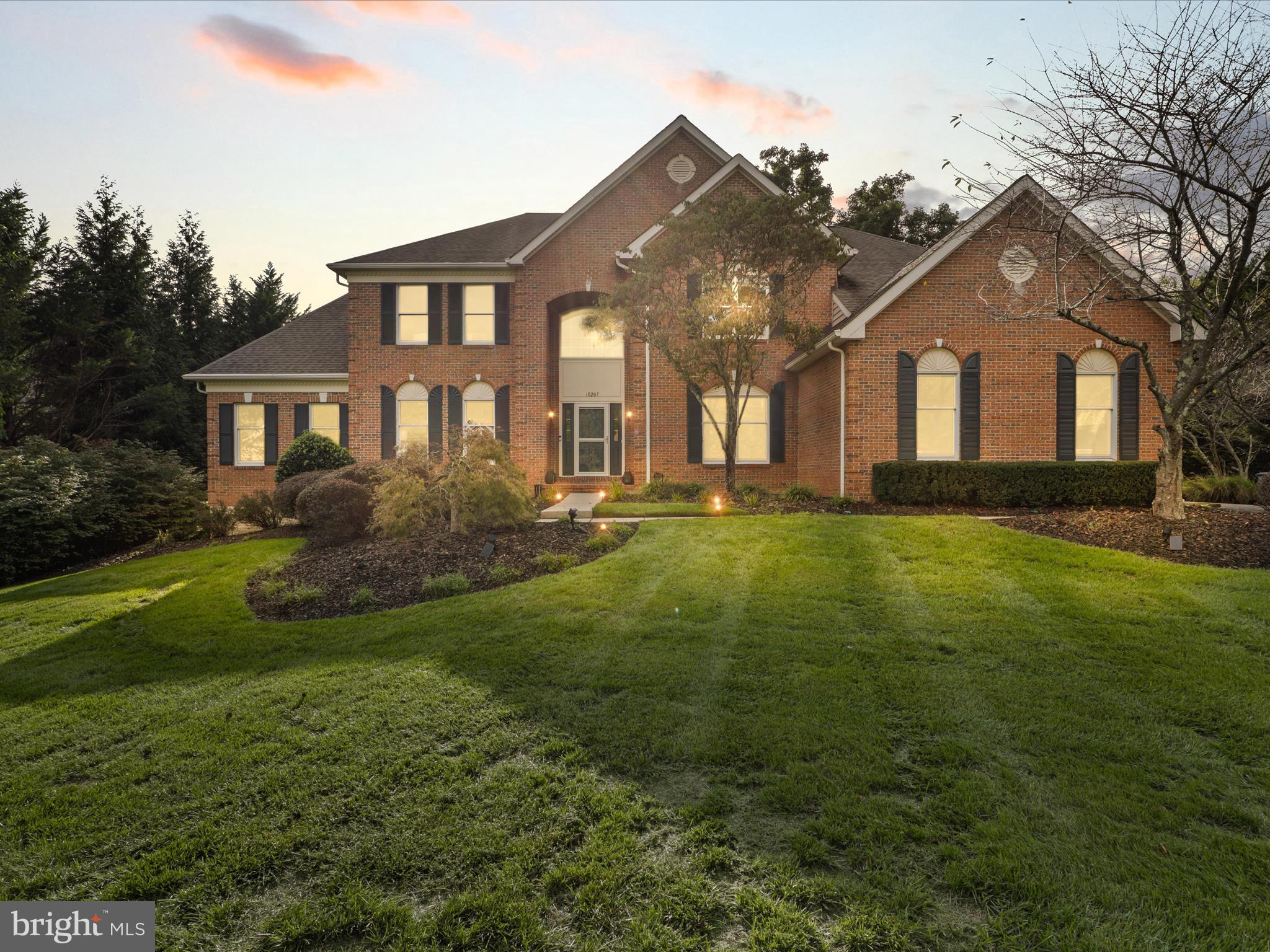 Stately Colonial on one of the best lots in the highly sought-after community of Hunter Mill Estates.  This home is nestled on a premium cul-de-sac location and is one of the largest homes offering almost 7000 sq ft of luxury living! This magnificent home offers the perfect blend of elegance, privacy, & modern comfort.  The home backs to protected parkland, providing a tranquil retreat with unparalleled privacy. Step inside to a grand two-story foyer with a sweeping curved staircase and gleaming hardwood floors throughout the main level. The heart of the home is the stunning, updated gourmet kitchen, featuring rich espresso cabinetry, granite countertops, a center island with cooktop, double ovens, and stainless steel appliances. The kitchen flows seamlessly into the sun-drenched two-story family room, creating a warm and inviting space for gatherings. The family room, with its dramatic palladium windows and a breathtaking floor-to-ceiling stone fireplace, is one of the most beautiful focal points of the home—truly the heart where friends and family will love to gather. The main level also boasts a private home office with custom built-ins, an expansive formal dining room adorned with a crystal chandelier, and an adjacent formal living room.  An upgrade originally added to the home was a 2-level conservatory extension. Outside, the backyard is a private oasis, centered around a heated free-form pool with extensive aggregate surround. This expansive area offers plenty of space, creating the perfect setting for pool parties, lounging, and entertaining large gatherings. The pool area is fully fenced, featuring a jacuzzi w/ waterfall, outdoor changing area, and professionally designed hardscaping and lighting. The extensive deck and roofed porch, inspired by southern charm and designed by a local architect, allows for year-round enjoyment. The entire deck/porch area has been recently refurbished & repainted. The finished walk-out basement offers additional luxury living, with a large bedroom, full bath, gym, yoga room, music room, and a custom cherry bar equipped with granite countertops, beverage refrigerator and a wall oven. A projector and 100-inch screen create the perfect space for movie nights. Upstairs, the spacious primary suite is a serene escape, featuring a coffered ceiling, sitting area, and two walk-in closets. The en-suite bathroom is equally impressive, with dual vanities, a soaking tub, and brand-new tile flooring.  Bedrooms 3 & 4 share a Jack and Jill bathroom with a new lighting, while the second bedroom enjoys a newly renovated en-suite bath. Much of the home has been freshly painted, including many of the ceilings, enhancing its bright and airy feel. The home was originally built with a 3-car garage, but one bay was cleverly converted to expand the laundry area, adding a large coat closet and built-in cabinetry, ideal for extra kitchen storage or kid's locker space. Located just minutes from Tysons Corner and the town of Vienna, this home offers proximity to some of the area’s finest shopping, dining, and entertainment. Tysons Corner Center and Tysons Galleria, known for their high-end retailers and gourmet restaurants, are a short drive away. Nearby Vienna boasts charming local boutiques, coffee shops, and parks. For outdoor enthusiasts, the area is rich with parks, bike paths, and nature trails, including Wolftrap, National Park for the Performing Arts, which hosts outdoor concerts and events. Additionally, the Hunter Mill Swim Club at the entrance of the neighborhood offers memberships for swimming and tennis. Commuters will love the easy access to all major routes and the Silver Line Metro. With its impeccable design, thoughtful upgrades, and unbeatable location, this home is a rare gem that offers both luxurious living and practical family spaces.  Dont miss out on this rare opportunity! Schedule your private showing today!