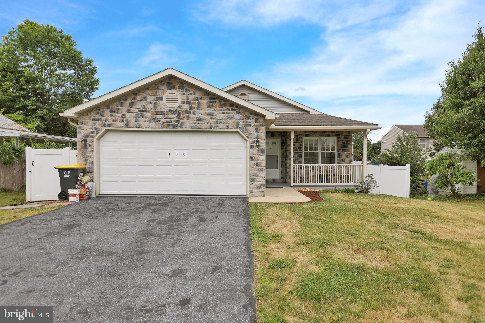 This charming ranch-style home, built in 1998 and set for a major renovation in 2024, offers a perfect blend of comfort and modern living. With 4 spacious bedrooms and 3 full bathrooms, this residence is designed for both relaxation and entertaining. The inviting interior features a cozy fireplace, a wet/dry bar, and a second kitchen, ideal for hosting gatherings. Enjoy meals in the bright breakfast area or unwind in the fully finished basement with walkout access. The exterior boasts low-maintenance aluminum and vinyl siding, complemented by a welcoming porch and well-maintained sidewalks. Parking is a breeze with an attached garage and additional driveway space. The home is equipped with stainless steel appliances, including a gas range and built-in microwave, ensuring a delightful cooking experience. With its excellent condition and thoughtful layout, this property is ready to become your sanctuary. Embrace the opportunity to make it your own!