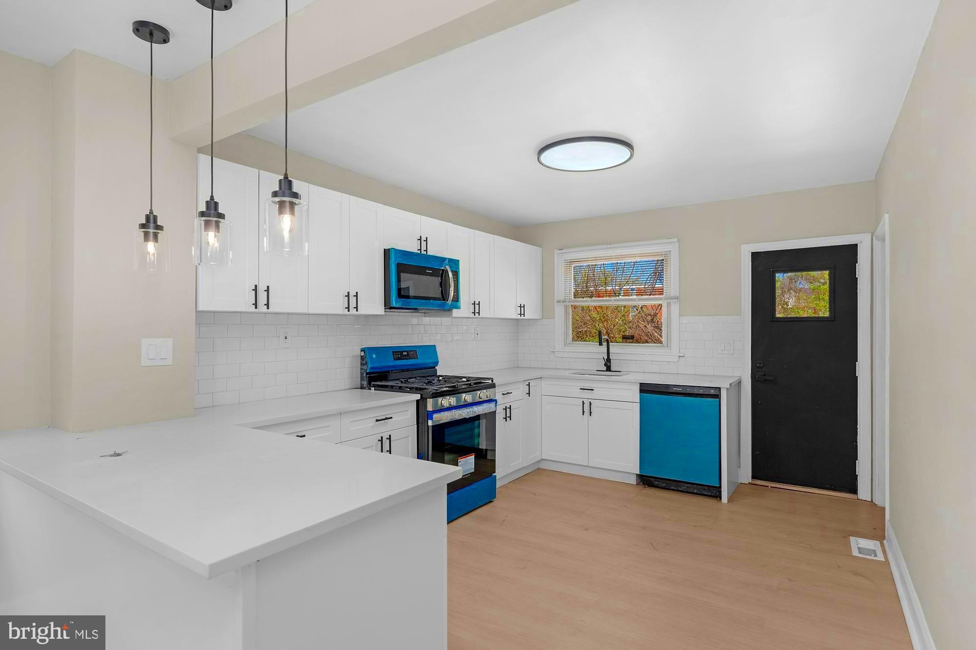 Welcome to 3708 W Cold Spring Ln — a beautifully updated single-level home that blends comfort, style, and convenience.

Step inside to find luxury vinyl plank flooring flowing throughout the main living areas, complemented by an abundance of natural light pouring in from oversized windows. The heart of the home is the brand-new kitchen, featuring sleek quartz countertops, stainless steel appliances, and a clean, modern design that’s perfect for both everyday living and entertaining.

This home offers three well-sized bedrooms, each with plush carpeting for added comfort, and two fully renovated bathrooms showcasing elegant marble-look tile and stylish new vanities.

Just off the kitchen, step out onto the rear deck — the perfect spot for morning coffee or evening gatherings — overlooking the backyard. The semi-finished basement adds valuable bonus space, ideal for a family room, home gym, or flex area, along with ample storage.

Located in a convenient and established area, this home offers close proximity to major commuter routes, shopping, and dining. Enjoy nearby green spaces like Druid Hill Park and easy access to cultural attractions such as the Baltimore Museum of Art. You’re also just minutes from the energy of Hampden, known for its unique shops, restaurants, and vibrant community feel.