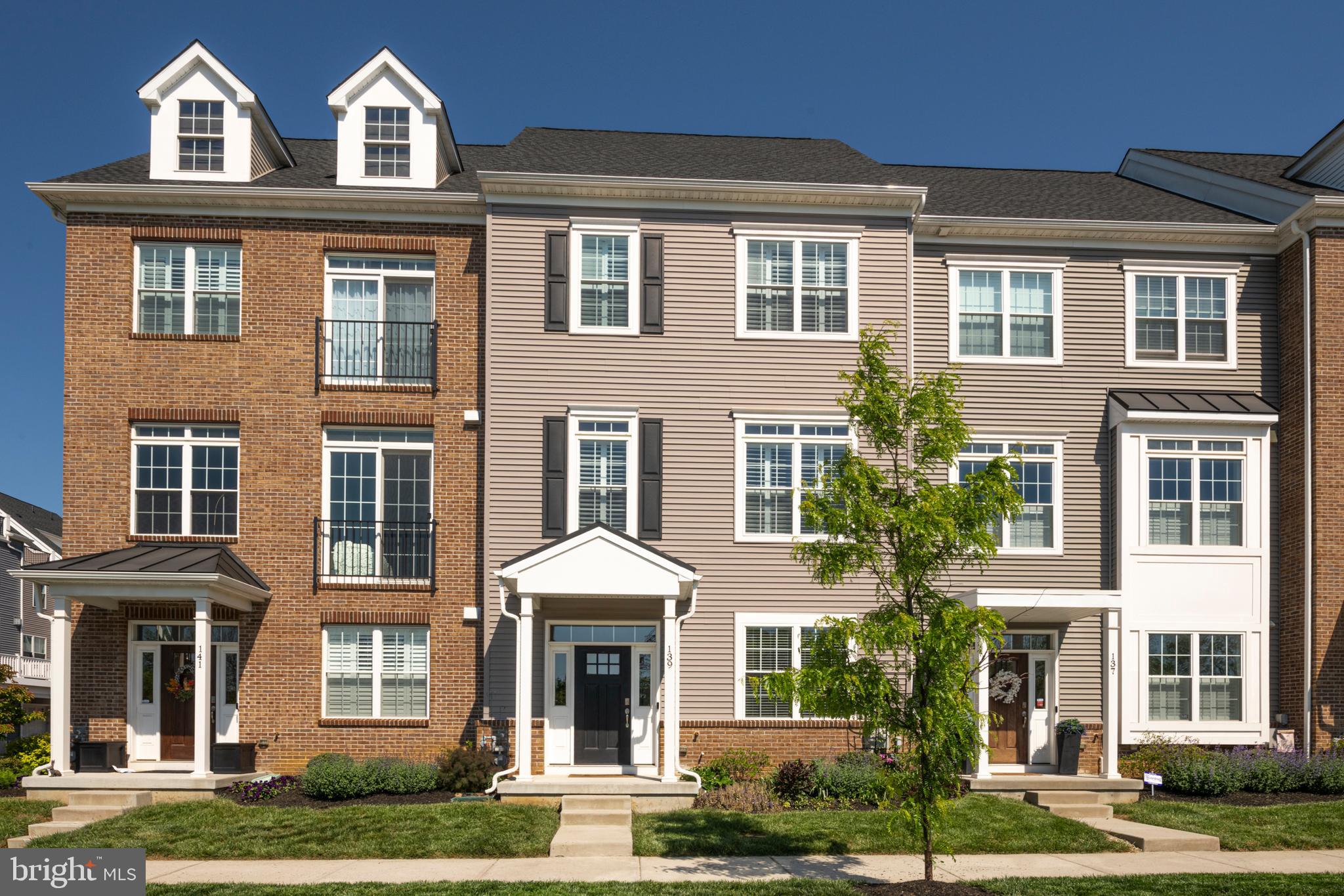Beautiful townhome  built by Rockwell with an amazing location in the community and located just blocks from amazing Downtown Phoenixville’s Vibrant community of events, fantastic restaurants and charming shops! Enjoy an evening of dinner, drinks & a show or a morning of coffee, shopping & Farmer’s Market without ever moving your car! This amazing home features beautiful hardwood floors, high ceilings, abundance of natural light & open concept. Enter the first level & be greeted by the office, closet space, entrance to 2 car attached garage & rear space. The 2nd level features a beautiful kitchen complete with island and exit to rear deck, opened to eating area and large living room. The 3rd level provides a great private area including the Main Bedroom suite complete with large main bathroom & walk in closet. One more floor provides you with a large bonus room with beautiful cabinets & counters which opens to the rooftop deck! Fireworks in Phoenixville! This is an amazing home in an amazing location at an amazing price! Great views including our newest addition - the Ferris Wheel!