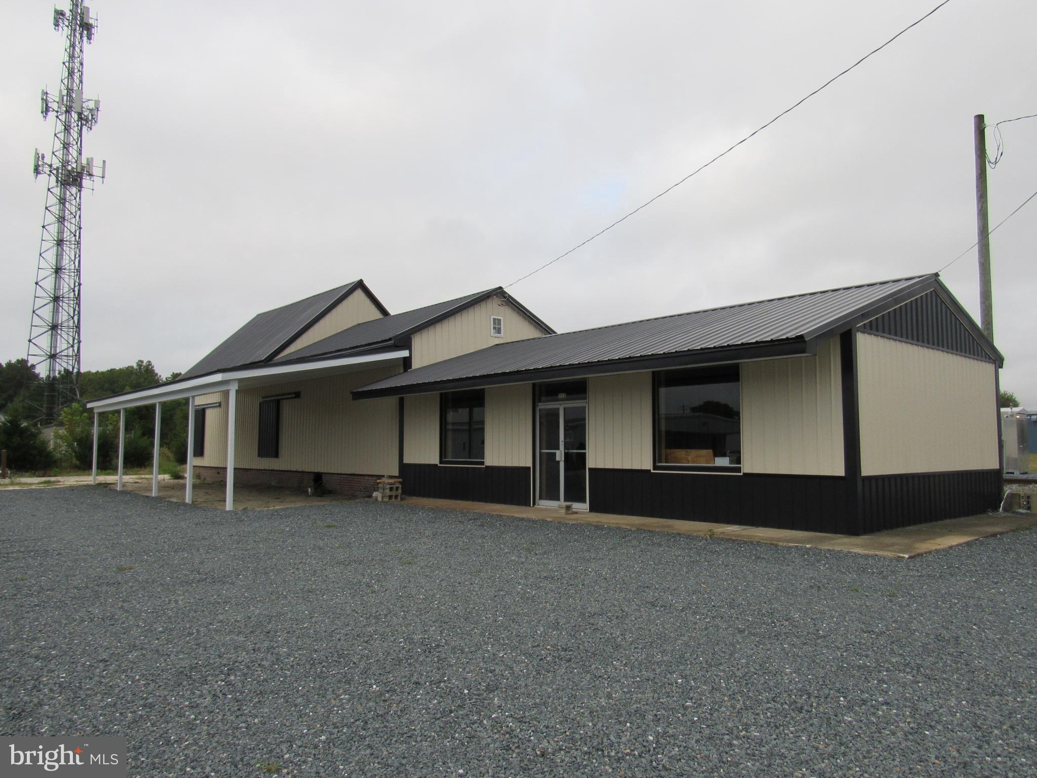 New exterior metal on roof, sidewalls, and lean-to.  New 200 amp electric service with recessed lights.  New water & sewer lines from building to street.  Gravel parking lot.  Zoned for Light Industrial use.  See attached Zoning Ordinance for Town of Laurel which includes specific L-1 uses.