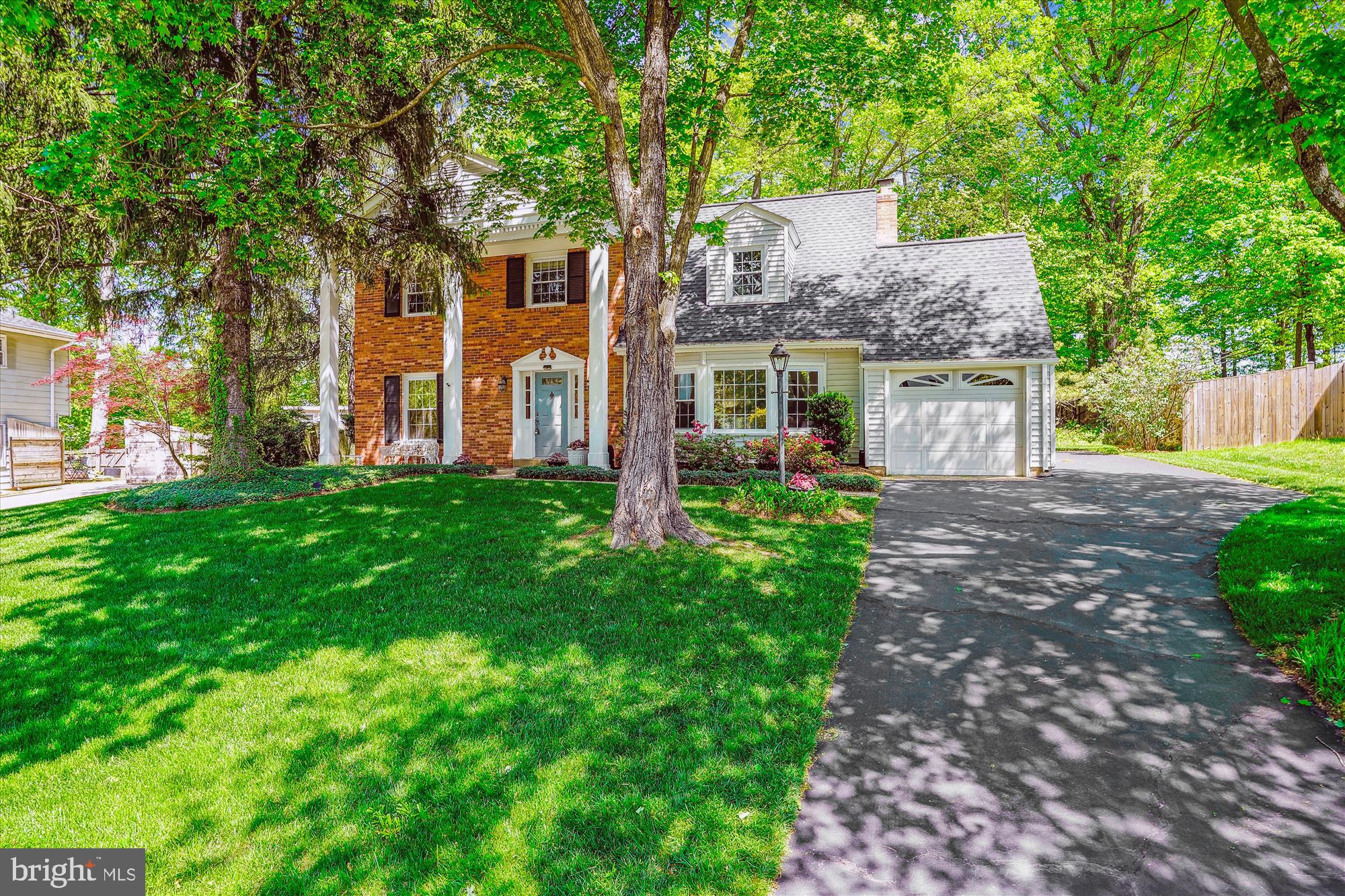 WELCOME TO THIS CHARMING CENTER HALL COLONIAL, PERFECTLY SITUATED ON A CUL-DE-SAC STREET AND SURROUNDED BY MATURE TREES. A BEAUTIFULLY LANDSCAPED YARD INVITES YOU IN. THE FORMAL LIVING ROOM FEATURES HARDWOOD FLOORS AND CROWN MOLDING, WHILE THE DINING ROOM IS ENHANCED WITH CHAIR RAILING AND CROWN MOLDING, CREATING A PERFECT SPACE FOR ENTERTAINING.  THE BRIGHT EAT-IN KITCHEN OFFERS PLENTY OF CABINETRY, A CUSTOM TILE BACKSPLASH, AND ACCESS TO A LARGE SCREENED-IN PORCH — AN IDEAL SPOT TO RELAX, DINE, OR ENJOY THE OUTDOORS. THE ADJACENT FAMILY ROOM, WITH WOOD BEAMS AND A BRICK WOOD-BURNING FIREPLACE, PROVIDES A WARM, INVITING SPACE FOR EVERYDAY LIVING. 
 A MAIN LEVEL LAUNDRY ROOM WITH SIDE-BY-SIDE WASHER/DRYER AND OUTDOOR ACCESS ADDS CONVENIENCE. UPSTAIRS, YOU’LL FIND THE PRIMARY SUITE WITH HARDWOOD FLOORS, TWO CLOSETS, AND A PRIVATE BATH, ALONG WITH THREE ADDITIONAL BEDROOMS AND A FULL HALL BATH.  THE UNFINISHED LOWER LEVEL IS READY FOR YOUR CUSTOM TOUCHES. THIS WELL-MAINTAINED HOME OFFERS A RARE OPPORTUNITY IN A PRIME LOCATION! SOME UPDATES/IMPROVEMENTS INCLUDE: UPPER LEVEL STAIRS/HALLWAY CARPET (2025), HOT WATER HEATER (2021), ROOF AND A/C (2016) WINDOWS (2006), FURNACE (2004)