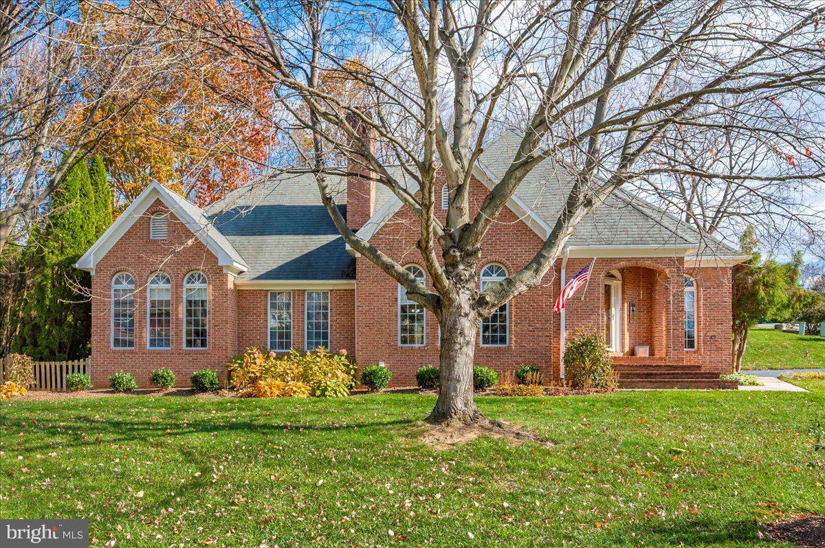 This French Style Brick home is situated on a 3/4 acre corner lot in sought after Brightwood Acres East! The home features expansive one-level living with high ceilings throughout. The large living room features a lovely brick fireplace and hardwood floors that continue throughout the formal dining room and hallway. The main level family room has French doors that lead out to the hardscape patio and huge fenced backyard. Expansive kitchen features stainless steel appliances, granite, sky lights and a breakfast nook. Main level laundry off of kitchen.. The primary bedroom boasts a tray ceiling and custom built-ins. The primary bath offers a large corner soaking tub, double vanity, walk-in shower and an oversized walk-in closet. The hall bath features a double vanity and a tub/shower. Nicely sized bedroom 2 & 3. Finished basement features a wet bar, bonus room, full bath and a legal egress escape window. Current owner has replaced HVAC, washer & dryer, refrigerator, garage door and opener, main level family room carpet, installed gutter guards and had new driveway installed. The home is close to Black Rock Golf Course, the Washington County Park, Hagerstown Community College and Meritus/Robinwood. Boonsboro school district. No HOA & No City Taxes! .One-Year Cinch Home Warranty! Great commuter location!
