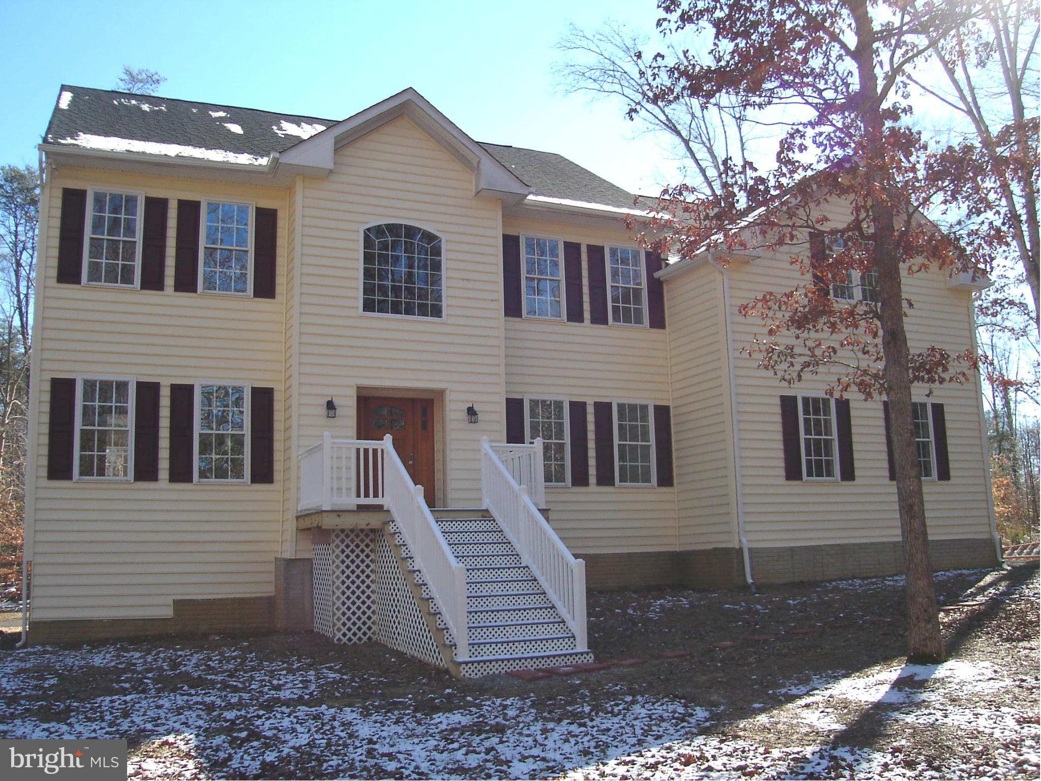 This is a new home, Credit Union foreclosed and completed construction, all permits and U&O have been obtained, Huge floor plan, all full baths have jetted tubs, bonus room in attic area, private setting, the house is pre-wired for Intercom and lighting.Family room set up for prefab fire place, the kitchen sells this home, large with up graded cabinets and a butlers pantry,call LA for more details