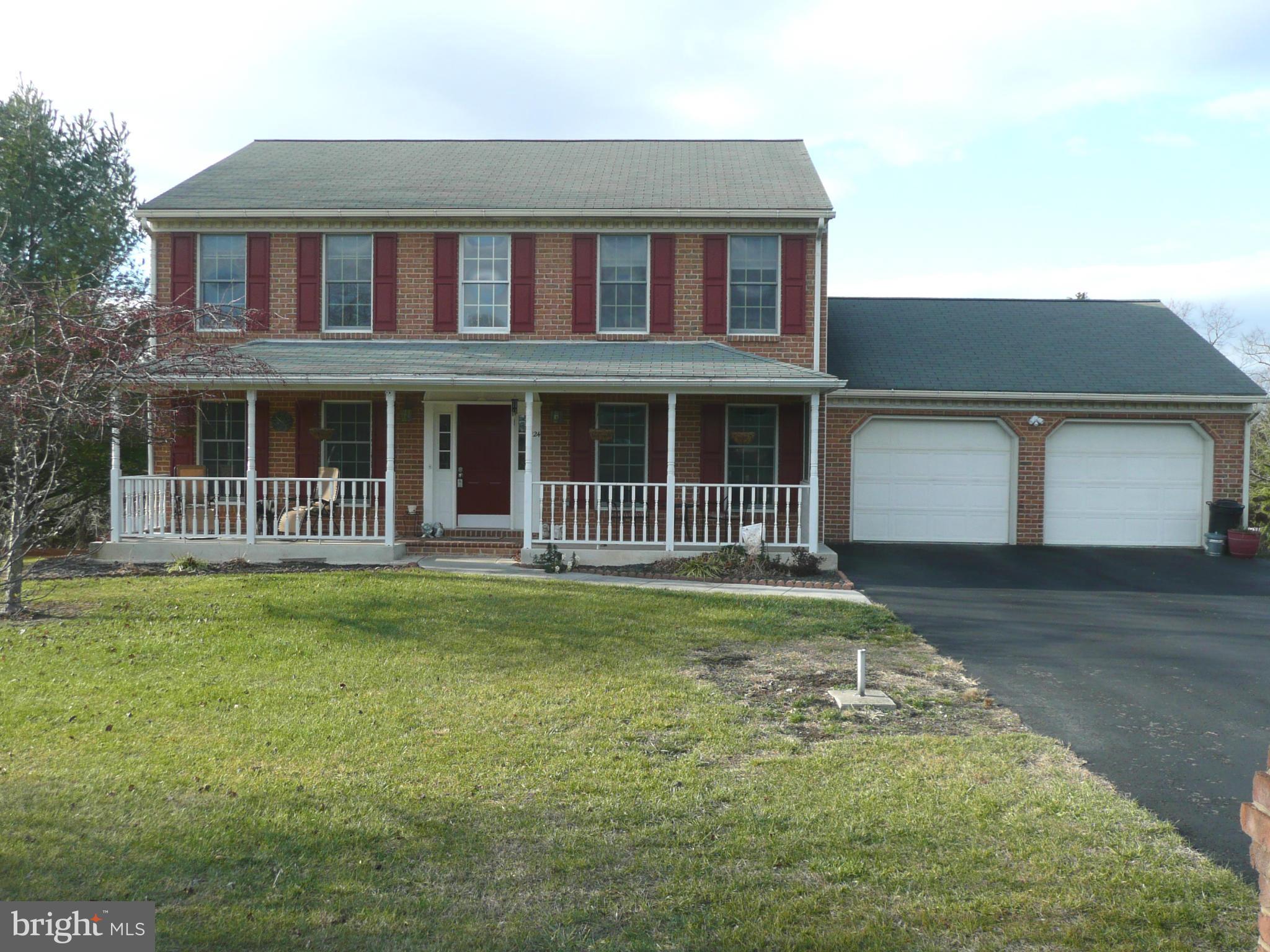 Spacious 3 BR, 2.5 BA Colonial, sitting on 2 park like acres in a well-established community of Marlowe Woods,w/easy access to I-81 & I-70 great for Maryland commuters. New Heating system Installed in 2014, over-sized 2 car garage, finished rec. room in basement w/gas fireplace and new carpet. New carpet also in formal living room. $5000.00 appliance allowance, generator and lawn tractor convey