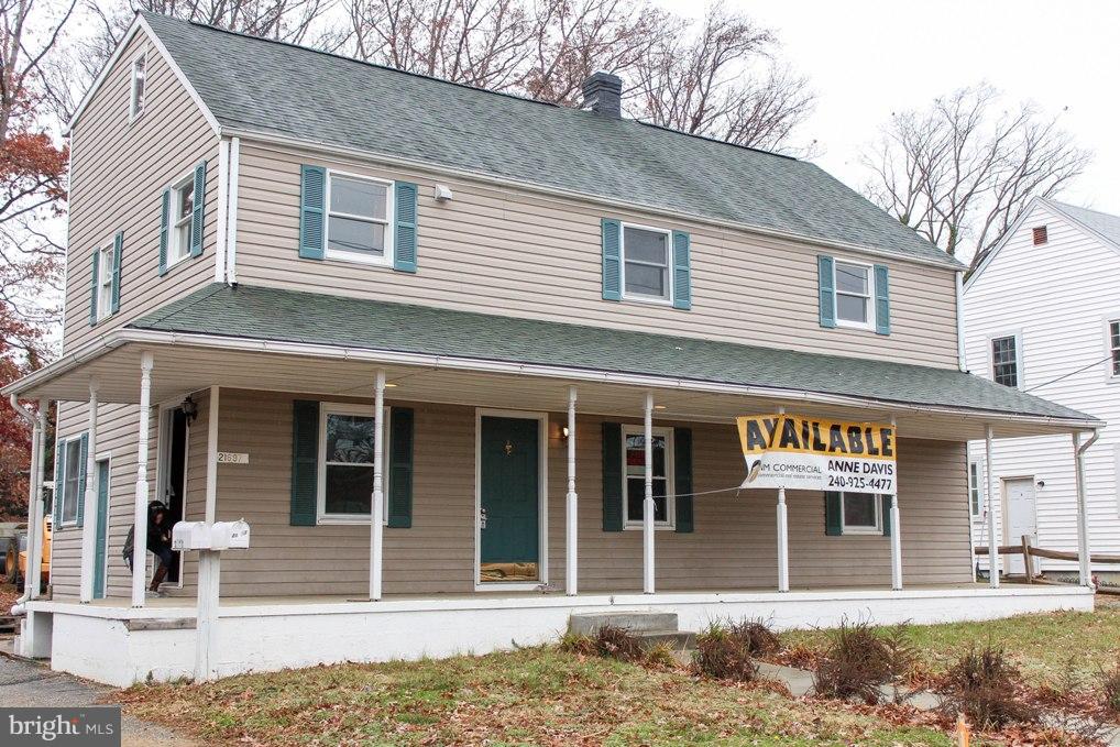 under contract. commercial office main level. 2/3 BR apartment on upper level