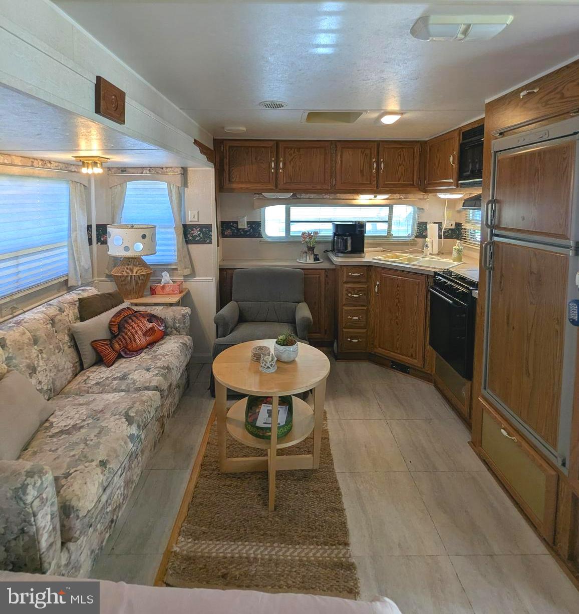 Discover the perfect escape with this immaculate, turn-key sewer lot located in a highly desirable community. This property offers a fantastic opportunity for immediate enjoyment, featuring a meticulously maintained Cross Roads travel trailer that is ready for your next getaway. The camper is exceptionally clean, sleeps four comfortably with a queen bed and a pavilion pull-out sofa, and comes equipped with appliances that are all in good working order.

The lot itself is complemented by a solid asphalt driveway and a functional pavilion, creating an ideal outdoor living space. Whether you are looking for a weekend retreat or a seasonal sanctuary, this property provides convenience and comfort in a prime location. Please note that the sellers are currently offering both Block 69 Lot 26 and Lot 27; they are open to selling them together as a larger package or separately as currently listed. Don't miss out on this rare, move-in-ready opportunity!

Key Property Features:
*   **Turn-Key Sewer Lot:** Prime, desirable setting with all essential utilities ready for use.
*   **Well-Maintained Accommodations:** Includes a clean, spacious Cross Roads travel trailer that sleeps four.
*   **Functional Living Space:** Features a queen bed, a pavilion pull-out sofa, and fully operational appliances.
*   **Outdoor Amenities:** Equipped with a durable asphalt driveway and an inviting pavilion for outdoor relaxation.
*   **Flexible Purchase Options:** Available as an individual lot or combined with the adjacent parcel (Lot 26) to suit your specific needs.