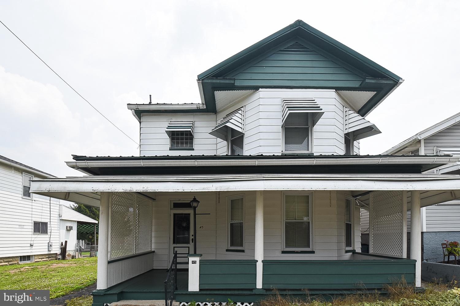 Behold, the charm!  This beautiful 2 story traditional home sitting in the heart of Keyser is just waiting for you to make it your own!  With a large fully fenced rear yard offering ample privacy, off-street parking, and a bonus family room on the main level, this one has something for everybody!
