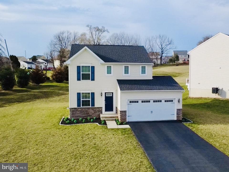 Coming soon! Expected on market April 8 This well-maintained 4-bedroom, 3.5-bathroom home in the desirable Oakcrest community offers over 1800 sq. ft. of living space, including a full in-law suite with its own kitchen and full bathroom. Built in 2017, this home features updated flooring and recessed lighting in every room. 

Step inside to discover a welcoming open layout, with new luxury vinyl flooring throughout the first floor. The living room flows seamlessly into the dining area, which offers easy access to the backyard through sliding glass doors. The spacious kitchen features stainless appliances and plenty of cabinets and counter space. A convenient half-bath, laundry room, and direct access to the 2-car garage complete the main level.

Upstairs, the sizable master suite provides a peaceful retreat with a walk-in closet and a private en-suite bathroom with double vanity. Two additional well-sized bedrooms, one with its own walk-in closet, share a full hallway bathroom. The fully finished lower level features a generous sized private in-law suite, complete with a kitchen and full bathroom—offering the ideal space for guests or multi-generational living.

Outside, the home benefits from a large driveway and plenty of yard space. Recent updates include all new flooring and new fridge, washer, and dryer (all 2023). Located in a beautiful neighborhood with plenty of green space and close to local amenities, this is a rare opportunity you won’t want to miss. Schedule your showing today and make this wonderful house your home!