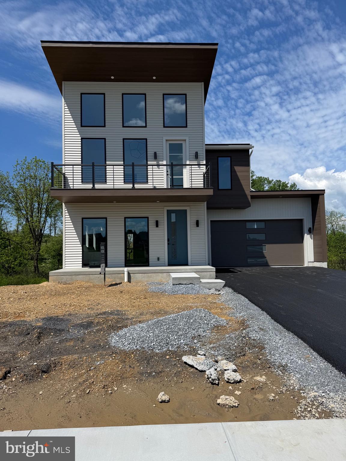 The EXA with LOFT & BASEMENT in Mountain Meadows.   Stop in and check out this brand new stunning floor plan!  ***NO HOA IN THIS COMMUNITY*** The EXA, another one of the four homes that are a part of our Cyber collection, which is designed for an upcoming community in Berks County. Come take a look at this three bedroom 1968 ft.² two-story home.  This master suite is like no other, with a vault ceiling flooded with light and with an exterior balcony. YES!  It is modern but it’s a warm modern with a cozy comfy feel. Not only will you have one of the first of its kind in the Lancaster, Lebanon, Berks County area, but it will also be one of the most efficient homes with our standard energy star level three third-party certified.   You may find that you enjoy paying your energy cost.