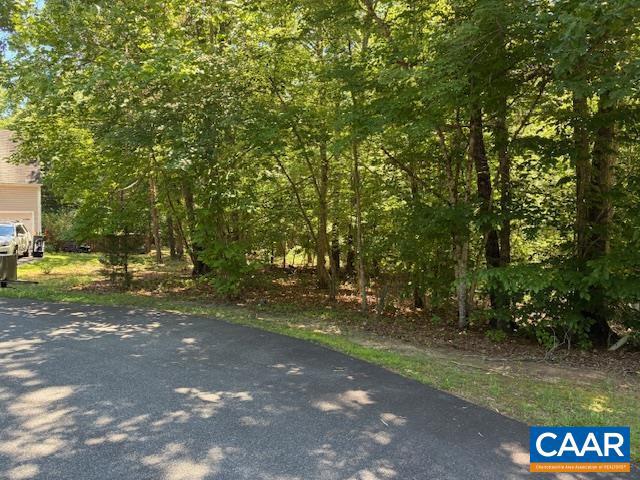 Resort living but with the comforts of home, come and see beautiful Shenandoah Crossings! This 1 acre lot sits ready for you to build your dream home in the heart of Louisa County.  And its not just for the mountains views either, this lot comes with all the resort amenities, like the Clubhouse, lake, gym, riding and walking trials, and more! This property is on a Cul-de-sac on Oatmont drive and backs up to the old golf course (now disc golf).  Bring your plans and put down roots at Shenandoah Crossings!