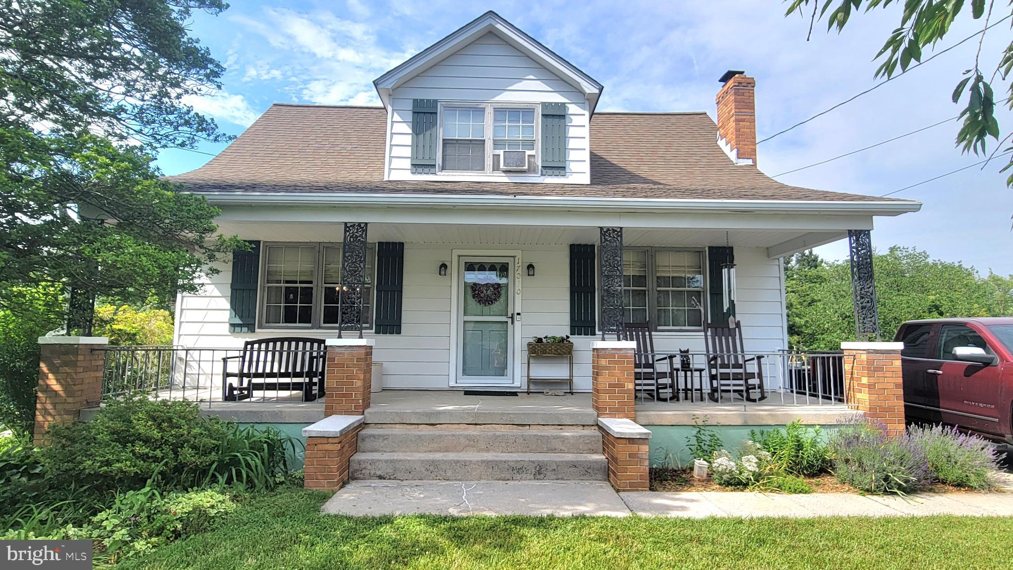 Home Sweet Home! Timeless Craftsman Charm with Modern Comforts.    Welcome home to this delightful 1946 Craftsman-style residence filled with character and warmth.   Offering 3 bedrooms, 1.5 baths, beautiful wood floors, and a welcoming floor plan, this home is ready for its next owner.
Relax in the spacious living room featuring a cozy fireplace or enjoy the versatility of the adjoining den/home office—perfect for today's work-from-home lifestyle.  The updated kitchen boasts maple cabinetry, abundant workspace, and includes all appliances.    Dining room is just steps from the kitchen and big enough for the whole family.    Need storage? The full basement provides plenty of room for storage, hobbies, or future possibilities.   One of the home's standout features is the inviting full-length front porch—the perfect place to enjoy your morning coffee or unwind in the evening.  step outside to a charming backyard complete with a peaceful fishpond, mature blueberry and elderberry bushes, and a detached shed/workshop that's ideal for gardening, woodworking, or any hobbyist.  Conveniently located for commuters and just minutes from shopping, restaurants, parks, and everyday amenities. Situated in the highly sought-after West Howard County school district.  This charming home offers the perfect blend of character, comfort, and convenience. Schedule your private tour today—homes like this don't stay on the market for long!