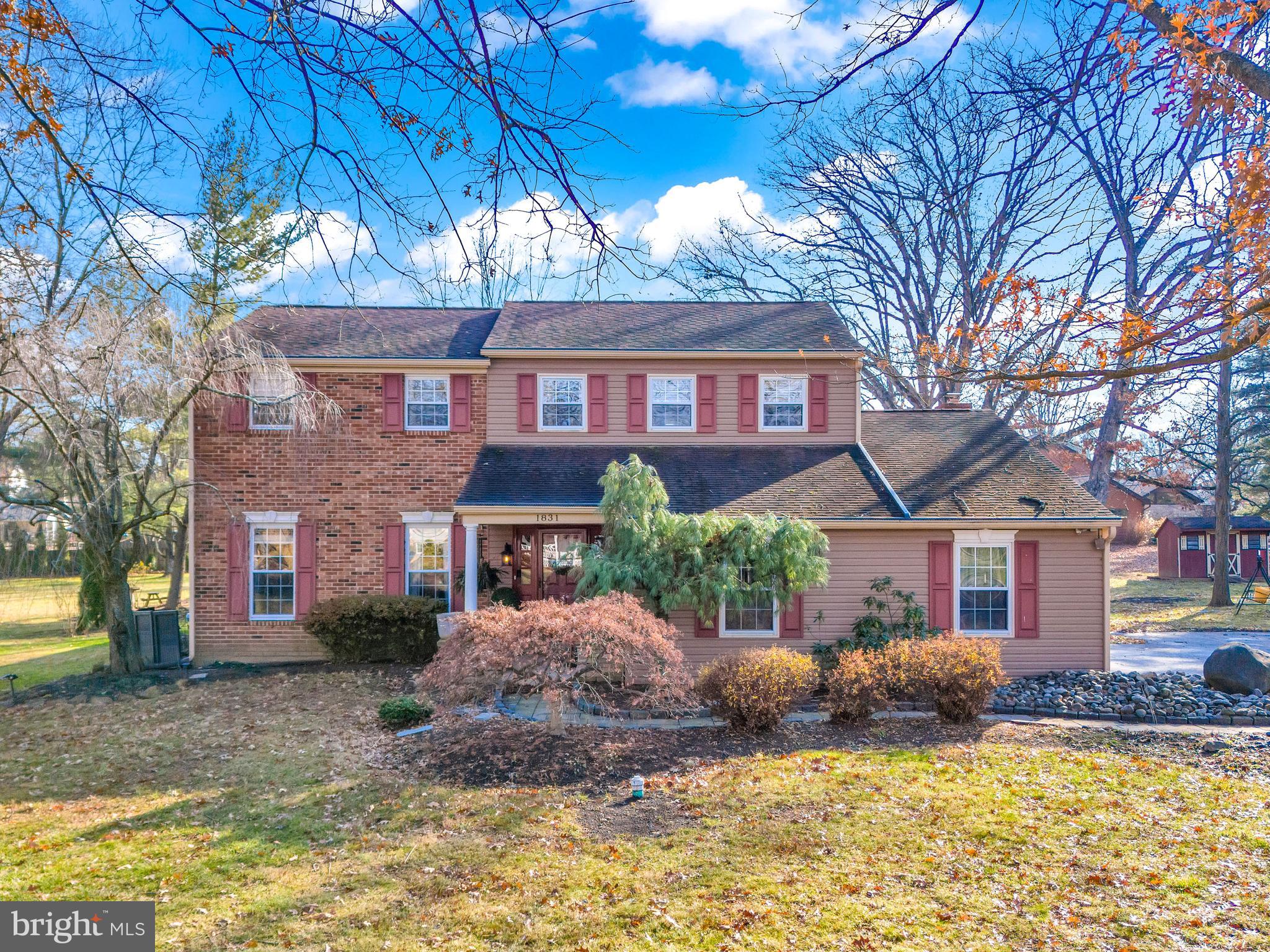Welcome to 1831 Supplee Rd, a beautiful 3,214 sq ft home nestled on .68 acres where location & condition meet for the perfect opportunity in the coveted neighborhood of Sugar Valley in Upper Gwynedd Township!  The handsome brick & siding exterior, manicured landscaping, paver walkway, and a covered porch lure guests inside this meticulously maintained and updated 4-bedroom, 2.5-bathroom property. Step inside a proper foyer to discover gleaming hardwood floors throughout, creating a warm and inviting atmosphere. The Main level boasts a spacious Living room with large windows, built-ins, and a faux fireplace adding to the style and charm.  With a seamless flow, it is an easy transition through the French doors to the Dining room, Kitchen, and Great room. The Kitchen is the heart of the home with 42’ cherry cabinets, granite countertops, tile backsplash, newer stainless-steel appliances (refrigerator, double oven, dishwasher, & glass top stove) a two-tiered center island with bar-top seating, and dining area. The Kitchen opens to the cozy Family room featuring a brick wall and mantle with a wood burning fireplace and double doors to allow for an abundance of natural light and to access the rear yard. The sun drench Great room is sure to impress with high vaulted ceilings, skylights, three separate sliding glass doors to the backyard, palladium windows, stunning views, a gas fireplace, and a massive flex space to allow for an additional Family room, dining, or recreation. The Main level also includes a powder room, laundry room with cabinetry, a utility sink, and a door leading to the driveway, and a door to access the side entry 2 car garage- all with ceramic tile flooring. The Upper level showcases a generously sized owner’s suite with a walk-in closet, and an owner’s bathroom with a Corian vanity, tub/shower, and ceramic tile.  Three additional sizeable bedrooms and a shared hall bathroom complete with a Corian vanity and tub/shower. Wood floors throughout the entire Upper level!  The finished basement is a true gem offering a versatile recreation room with porcelain tile flooring – perfect for a yoga studio, home gym, pool table, home office, playroom, etc. The backyard has a deck, fenced in-ground pool, a flat yard for recreational play, garden areas, and mature trees- making this a perfect oasis for gathering with family & friends. Additional noteworthy features include newer appliances, newer gutter guards, newer pool cover, newer pool filter & pump, HVAC 2016, newer water heater, newer sump pump w/ battery back-up, recessed lighting, ceiling fans, and much more! Beyond the allure of the property itself, its location is a true standout feature of this inviting home, which is conveniently situated within walking distance to Gwynedd Square Elementary & Corpus Christi. Close to shopping, Septa train stations, and major routes – all in award winning North Penn School District! Turn-key & move-in ready!