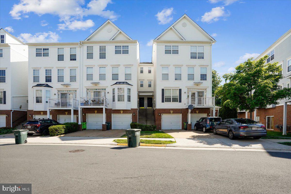 4-level townhouse-style condo in desirable Coppermine Crossing offering spacious, light-filled living and an ideal commuter location. Spacious walk-out recreation room on the lower level offers endless possibilities — perfect for a home office, gym, media room, playroom, guest space, or game room. Stunning primary suite features double-door entry and a luxurious bath with separate soaking tub and shower.  The bright center-island kitchen with table space is ideal for everyday living, gatherings and opens to peaceful rear views of wooded area and walking path.. Conveniently located near shopping, restaurants, parks, major commuter routes, and the Reston Town Center Metro Station.