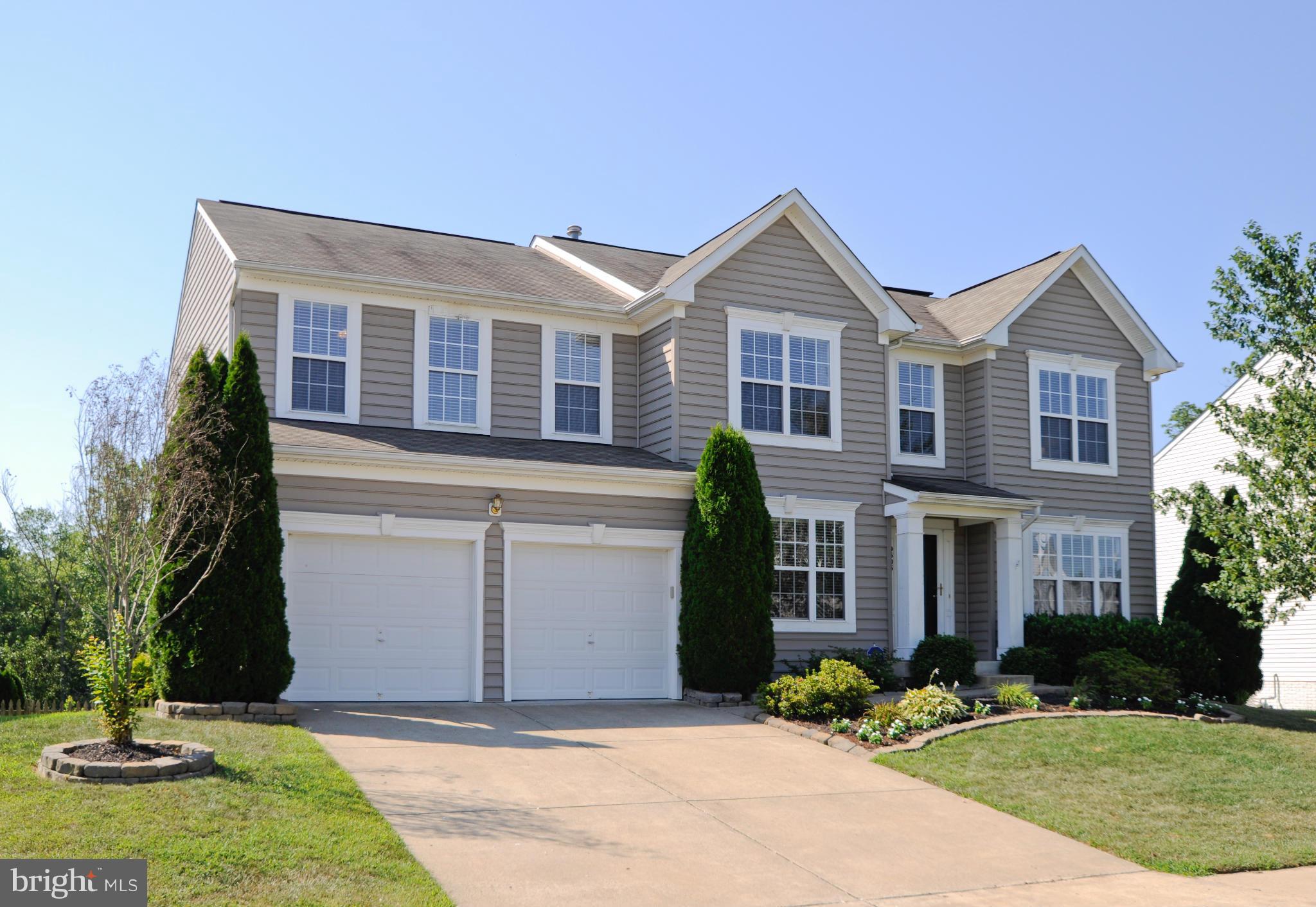 Gorgeous Move-In Ready Home! This home truly has it all!From its' open floor plan to large oversized rooms to a bonus open area on the bedroom level to a private fenced in backyard that backs to trees to a screened in porch...you will not be disappointed. Large bedrooms feature walk in-closets/Beautiful molding throughout/Master bedroom suite features custom wainscoting...you have to see it all!