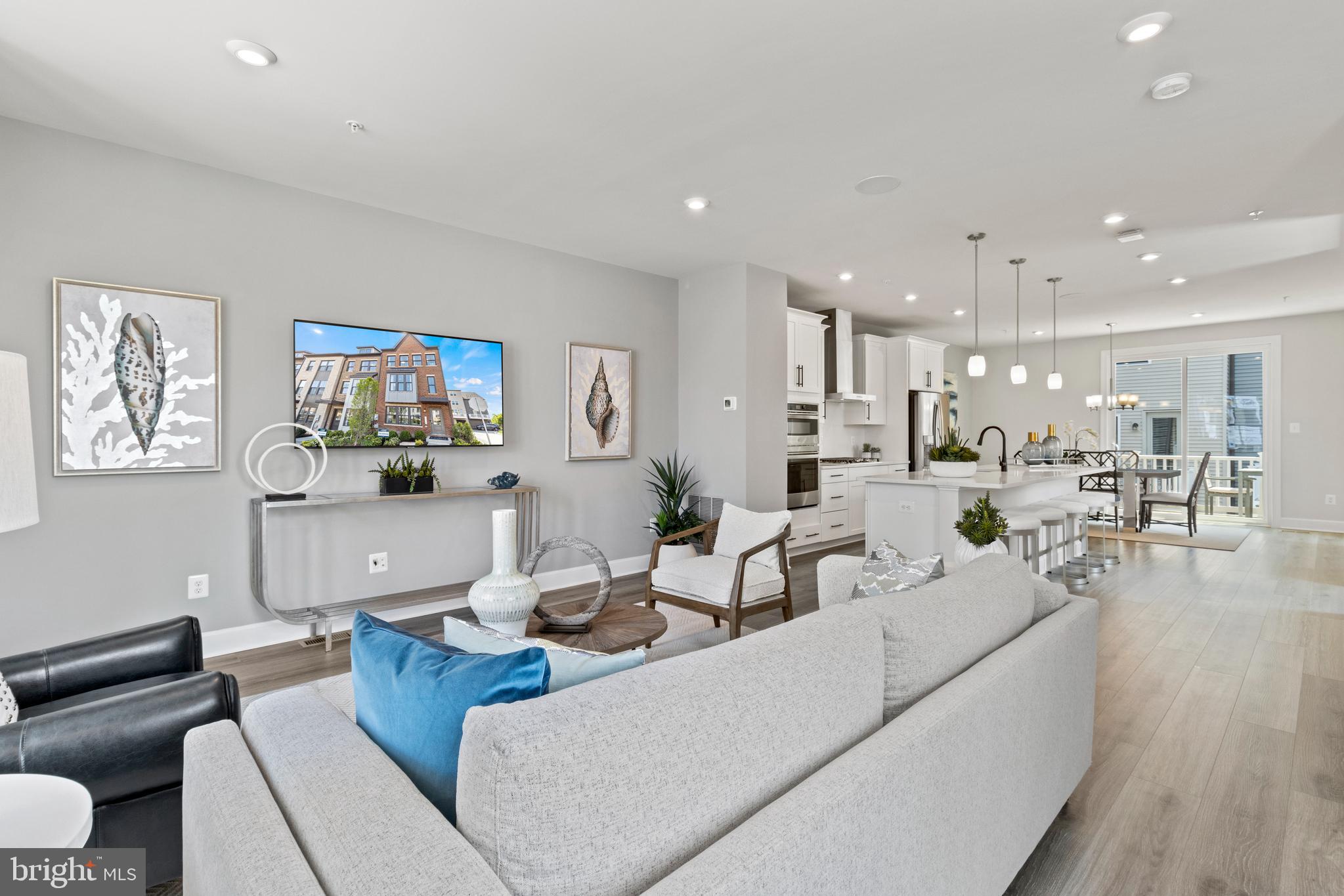 Introducing the last available 4-bedroom Jenkins floorplan in Phase 1 - a remarkable end unit home that caters to both growing families and astute investors alike. Step inside and be captivated by the spaciousness and versatility of this stunning residence. As you enter, you'll be greeted by a welcoming foyer that sets the stage for what lies ahead. To your right, you'll find a generously sized bedroom complete with a full bath, offering the perfect retreat for guests or family members seeking privacy and comfort. The heart of this home resides on the main level, where the gourmet kitchen takes center stage. Immerse yourself in the art of culinary excellence as you prepare meals using top-of-the-line appliances and enjoy the convenience of ample storage space. The kitchen seamlessly flows into the living and dining areas, creating an open and inviting atmosphere for entertaining loved ones or relaxing after a long day. Step outside onto the deck and soak up the beauty of the surrounding landscape. Whether you're sipping your morning coffee or hosting a summer gathering, this outdoor oasis provides the perfect backdrop for creating memories that will last a lifetime. This remarkable home is not only a haven of comfort and style but also a smart investment opportunity. With its proximity to Washington DC, this property offers an unparalleled location for those seeking the excitement and convenience of urban living. From world-class dining to renowned cultural attractions, the vibrant energy of the nation's capital is just a stone's throw away. Imagine the possibilities that await you in this prime location. Whether you're exploring the rich history of the Smithsonian museums, strolling along the National Mall, or indulging in the diverse culinary scene, this home places you at the epicenter of it all. Don't miss out on the chance to make this exquisite 4 bedroom 3.5 bath residence your own. If you're looking to create a nurturing space for your growing family or seeking an investment opportunity that promises impressive returns, this home ticks all the boxes. Photos shown are from a similar home.  Contact us to schedule a tour or stop by and visit our model home today!