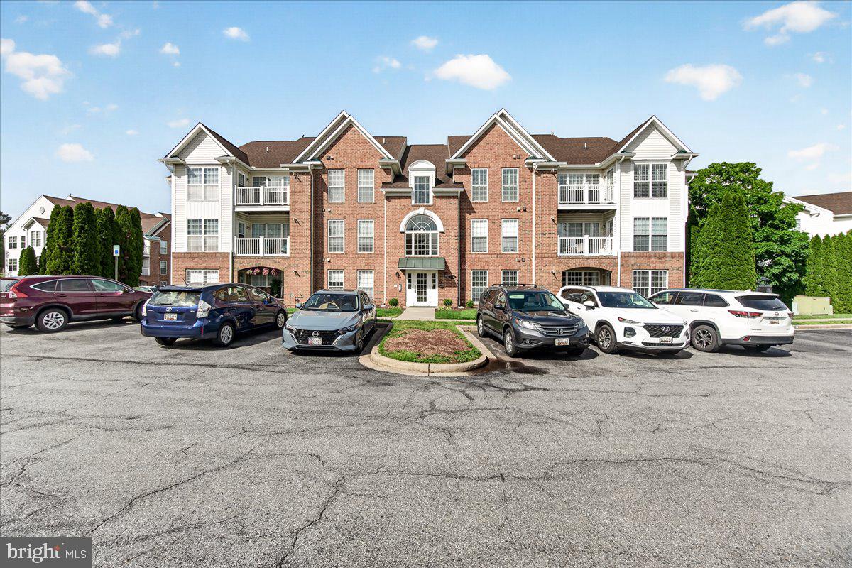 Welcome to this beautifully maintained ground-level condo offering the ideal combination of comfort, convenience, and low-maintenance living. With over 1,200 square feet, this spacious, move-in ready home features an open-concept floor plan with two generously sized bedrooms and two full bathrooms. The inviting living area flows seamlessly into the dining space and well-appointed kitchen, creating the perfect setting for both everyday living and entertaining. The kitchen offers ample cabinetry, excellent functionality, and all appliances convey—including the in-unit washer and dryer for added convenience. The spacious primary suite serves as a relaxing retreat, while the second bedroom provides flexibility for guests, a home office, or hobby space. Step outside to your private patio, perfect for morning coffee or unwinding in the evening. Conveniently located on the ground floor with no stairs, this home offers easy accessibility for a variety of lifestyles. Enjoy the added benefit of front-row parking and a prime location close to shopping, dining, and everyday amenities. This well-maintained condo combines effortless living with an unbeatable location.