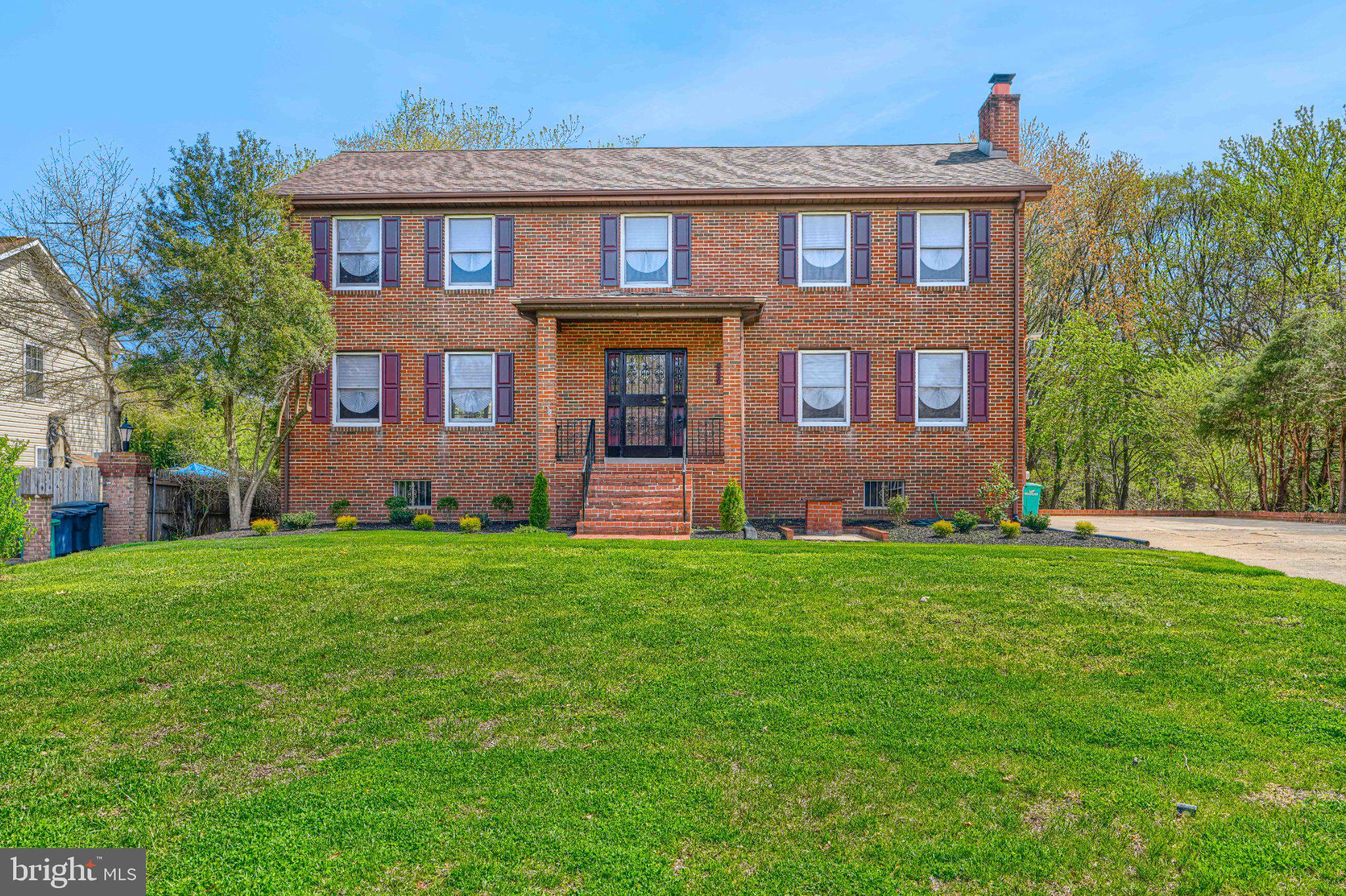 Welcome to 6510 Horseshoe Rd in Clinton, MD, just minutes away from Andrew’s Air Force Base. This all-brick and block construction home built to stand the test of time, now completely remodeled with over $100,000 in updates, blending classic craftsmanship with modern upgrades. This home makes a strong first impression with its large front yard and private driveway, while the covered front porch offers a practical space to kick off your shoes before heading inside. Step into the foyer and you’re immediately greeted by elegant imported tile flooring from Italy and a stunning curved staircase banister that adds a touch of sophistication. From here, the home opens up to a spacious and well-designed main level featuring a large formal dining room off the kitchen—perfect for gatherings—and an even larger living room, offering incredible flexibility for entertaining or everyday living. Just beyond, the cozy family room serves as the heart of the home, complete with a beautiful oversized brick fireplace that creates a warm and inviting atmosphere. The kitchen is designed to impress with tons of cabinet space, brand-new countertops, stainless steel appliances, updated fixtures, and modern lighting—fully renovated and ready for today’s lifestyle. A main-level laundry area and half bath add everyday convenience. Upstairs, you’ll find new carpet throughout and four generously sized bedrooms, including a primary suite with its own private bath. Both the primary bathroom and hall bath have been fully renovated with fresh, modern finishes—move-in ready and sparkling clean. Major updates include a brand-new HVAC system, giving you peace of mind for years to come. The basement is a wide-open blank slate, offering endless potential for a rec room, home gym, office, or additional living space. A large attic provides even more storage—something today’s buyers truly value. Out back, enjoy a flat, semi-wooded backyard with mature trees, offering privacy and space to relax or entertain, along with a convenient storage shed. If you’re searching for a solid, fully updated home with character, space, and long-term value, 6510 Horseshoe Rd delivers. Conveniently located near shopping, dining, and major commuter routes—this is one you don’t want to miss.