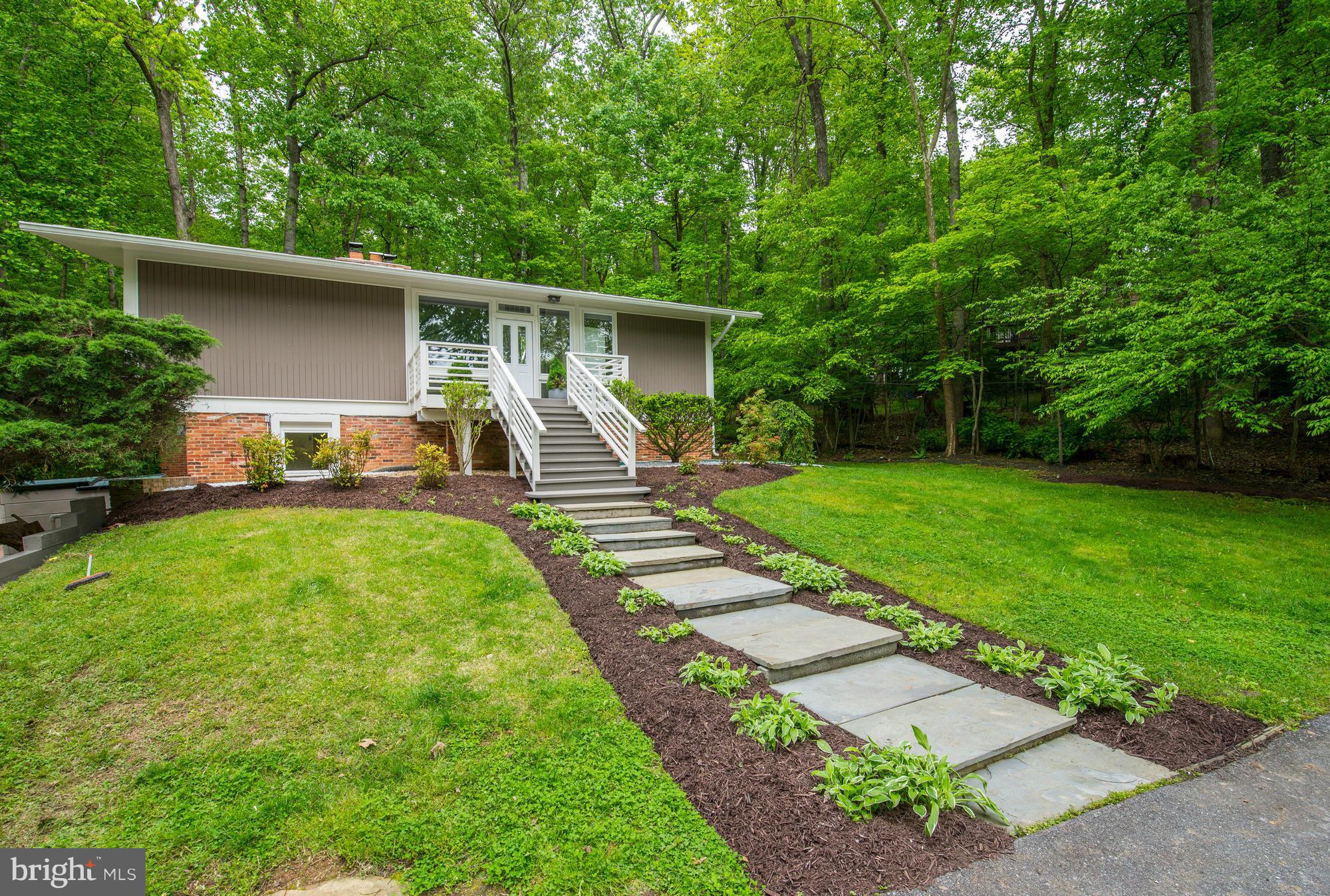 New price! Make an offer! Fabulous contemporary home nestled on a wooded lot with a gazebo and pool to complete a zen atmosphere! Open floor plan with brick wall/fireplace separating living room and dining room/. New interior and exterior paint. New quartz countertops and appliances. Updated BA's includes new flooring, vanities and fixtures.
