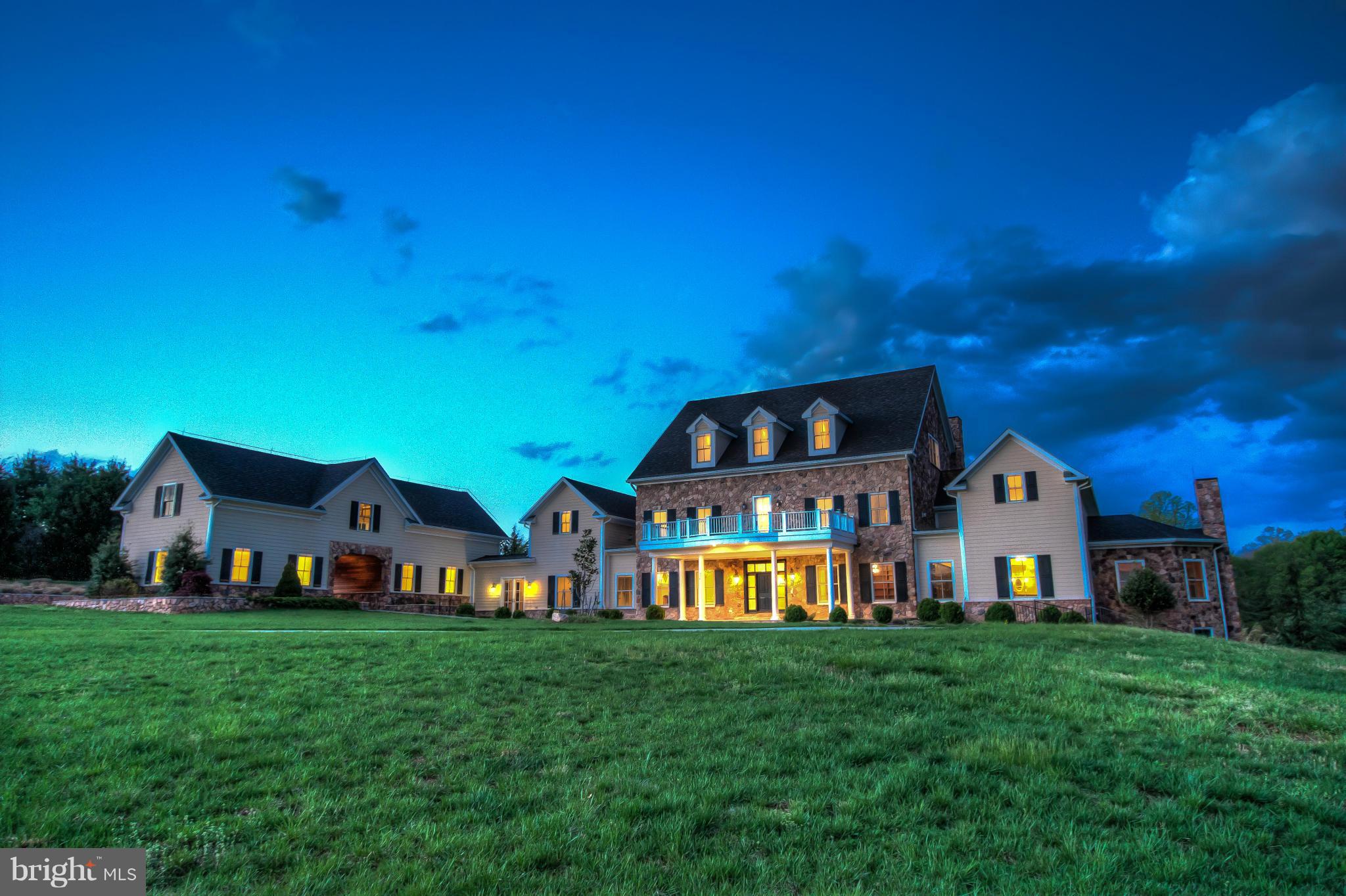 Magnificently sited on a private 5.9 acre lot, this brand new custom built Middleburg manor estate offers more than 17,000 square feet of exquisite artisan crafted living space. The developer has spared no expense in the construction of this masterwork, with top-of-the-line finishes including: custom hand crafted cabinetry & detail work, grand formal & casual living & entertaining spaces, and more