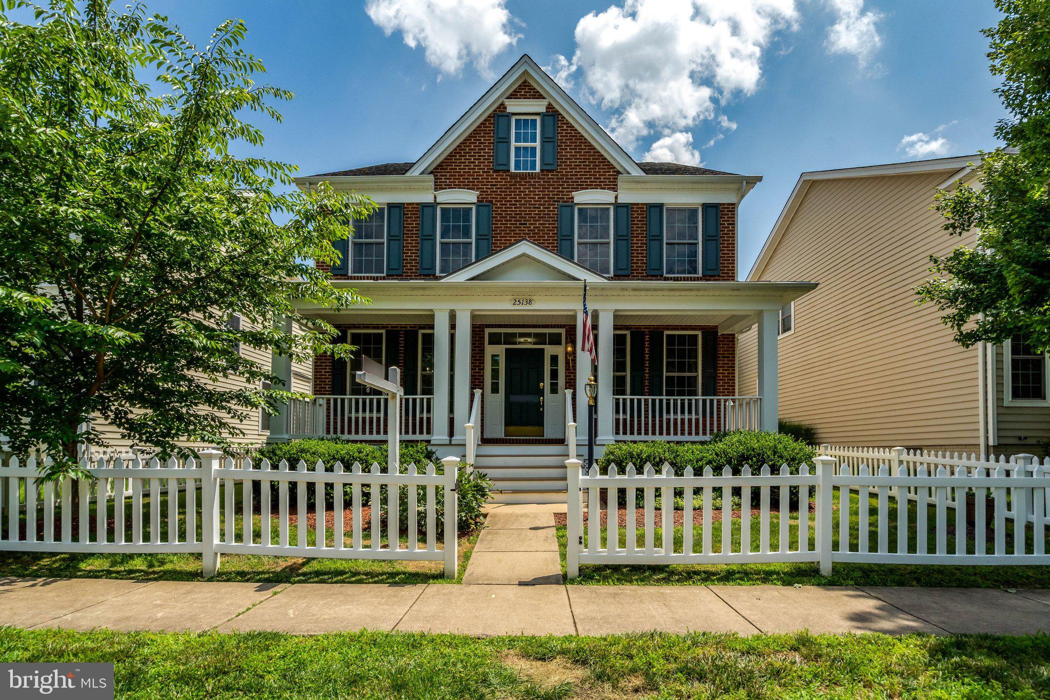 Your white picket fence dream is real, and it's waiting for you on Justice Drive.

From the moment you pull up to this stunning brick-front colonial in sought-after South Riding, you'll feel it. This is home. The iconic white picket fence, charming front porch, and classic curb appeal set the tone for everything inside.

Step through the front door onto gleaming hardwood floors that flow across the entire main level, most areas freshly painted and move-in ready. The kitchen is a true centerpiece — off-white cabinetry, gleaming granite countertops, stainless steel appliances, and a large center island that invites conversation while you cook. The open layout connects seamlessly to the family room, making everyday living and entertaining effortless.

Just beyond, a breathtaking sunroom with a vaulted arched ceiling and walls of windows fills the home with natural light — the kind of space you'll live in year-round, whether it's Sunday morning coffee or a quiet afternoon retreat.

The primary suite is nothing short of a sanctuary. A luxurious soaking tub, double vanity, spa-like natural light, and an expansive custom walk-in closet with built-in wood shelving offer the kind of storage and serenity that feels like a fresh start.

With 4 bedrooms, 4.5 baths, and over 4,500 sq ft across four finished levels, there's room for every chapter of your life. The lower level with kitchenette offers flexibility for multi-generational living, guests, or an au pair suite. The finished fourth level with a full bath is ideal as a bonus room, home office, or Man-Cave with the conveying slate pool table. . A fully fenced backyard completes the picture.

And then there's the community. South Riding surrounds you with four clubhouses with swimming pools, 12 playgrounds, a dog park, pickleball and tennis courts, two fishing piers, and miles of scenic trails. The state-of-the-art Dulles South Recreation and Community Center adds an indoor pool, lazy river, fitness center, rock-climbing wall, and outdoor skate park are all just minutes away. Easy access to Dulles Airport, top-ranked Loudoun County schools, and Stone Springs Hospital just 3 miles west means every practical need is covered too.

This isn't just a house. It's a place to exhale, to grow, and to feel like yourself again.

Welcome home.