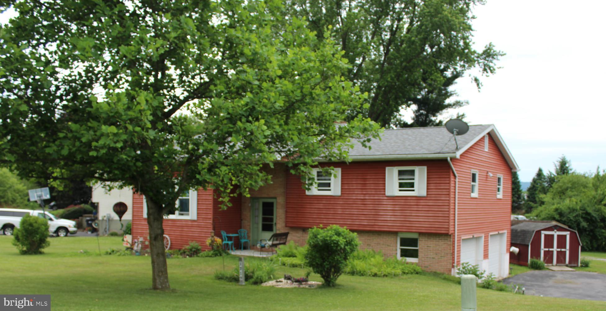 Very well-maintained home offering numerous updates and desirable features throughout. The roof is only 7 years old, and the windows were replaced just 2 years ago for added efficiency and peace of mind. Enjoy the comfort of a whole-house fan and spacious double closets in all bedrooms. The owner's suite includes a private shower, while the main bath features a convenient tub/shower combination. Additional highlights include a bright sunroom, a family room in the lower level, a dedicated laundry room, and ample storage areas. Outside, you'll find a two-car garage and a blacktop driveway, completing this move-in-ready property.