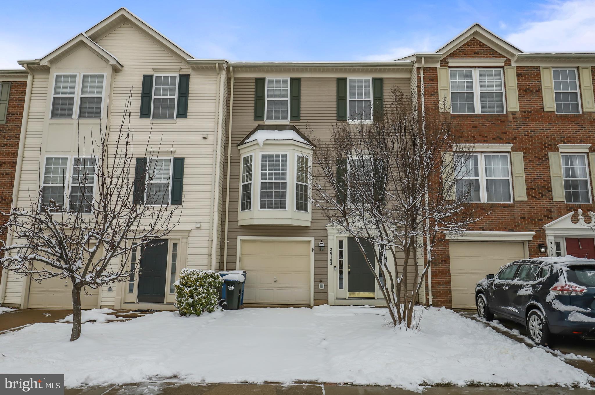 This exceptional and spacious townhome is move-in ready!  Whole house is freshly painted with neutral paint from floor to ceiling and brand NEW carpets!  Interior features include:  *** 3 Level Bump Out **Every room is accented by elegant chair and crown moldings**Upgraded Recessed Lights throughout** Hardwood floors on main level** Bay window in Living Room provides lots of natural light** Fireplace is perfectly situated in the bump out for a cozy morning room overlooking Deck** Remodeled kitchen is well appointed with pristine white cabinets, backsplash, stainless steel appliances, granite and movable custom island!   Upstairs, the three bedrooms include the primary bedroom boasting vaulted ceilings and ensuite bath with double sinks, tub and stand up shower.  Entertain in the spacious recreation room with walk-out to a paver patio and private fenced backyard.  This home has beautiful finished spaces and is so easy to love!   ***SUBMIT OFFERS BY Sunday 1/21 8pm.  Decision will be Monday 1/22 AM**