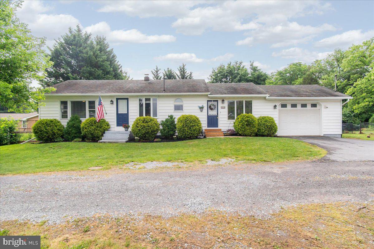 Updated, move-in ready, and exceptionally well maintained, this rancher is packed with value. Located on a small dead-end street, the home offers a setting with minimal through traffic while remaining incredibly convenient to shopping, dining, schools, commuter routes, and everyday amenities. Inside, you'll find a spacious remodeled kitchen featuring granite countertops, stainless steel appliances, abundant cabinetry, generous workspace, and room for a dining table. The bright living room provides a comfortable gathering space with access to the rear deck, while four bedrooms and a beautifully updated full bathroom offer flexibility for family, guests, hobbies, or home office needs. The full basement provides extensive storage and excellent potential for future finished living space! Recent updates, including the heat pump and central air system, hot water heater, pressure tank, UV water filtration system, and water softener, provide peace of mind and make this home truly ready for its next owner. Outside, you'll find a spacious yard, rear deck, off-street parking, and an attached garage. One of the home's standout features is its proximity to Halfway Park, which is within walking distance and offers something for everyone, including walking trails, ball fields, playgrounds, picnic areas, and a community pool. With its combination of updates, four-bedroom flexibility, garage, basement potential, and convenient location, this property offers an outstanding opportunity for buyers seeking a home they can enjoy from day one while still having room to grow in the future.