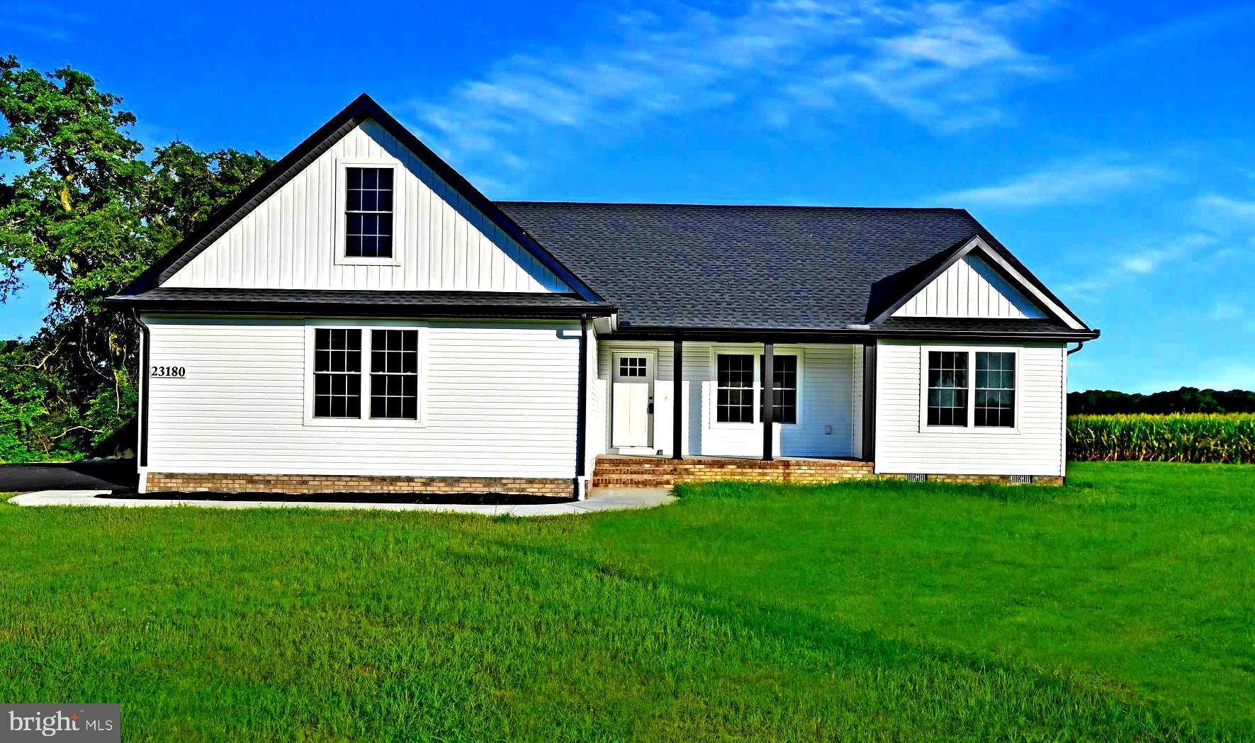 DON’T WANT A NEIGHBORHOOD OR HOA? LOCATION, LOCATION, LOCATION!

Welcome to the perfect blend of privacy, convenience, and coastal living. Nestled on a private lot with no HOA, this newly built ranch-style home offers peaceful country surroundings while being just minutes from Delaware beaches, local hospitals, shopping, dining, and everyday conveniences. Enjoy the beauty of open farmland views without sacrificing accessibility.

This thoughtfully designed 3-bedroom, 2-bath home features an inviting open floor plan with a split-bedroom layout, offering both comfort and privacy. The bright sunroom overlooks the rear yard and opens to a spacious 12' x 18' patio—perfect for relaxing and taking in the serene countryside views.

Quality craftsmanship shines throughout with upgraded features including 6-inch exterior walls, double-hung windows, luxury vinyl plank flooring, upgraded countertops, a center island, and plush carpeting in the bedrooms. Additional highlights include a blacktop driveway and a full-size two-car garage for added convenience and curb appeal.

If you’ve been searching for a modern home with space, tranquility, and easy access to everything coastal Delaware has to offer, this property checks every box.