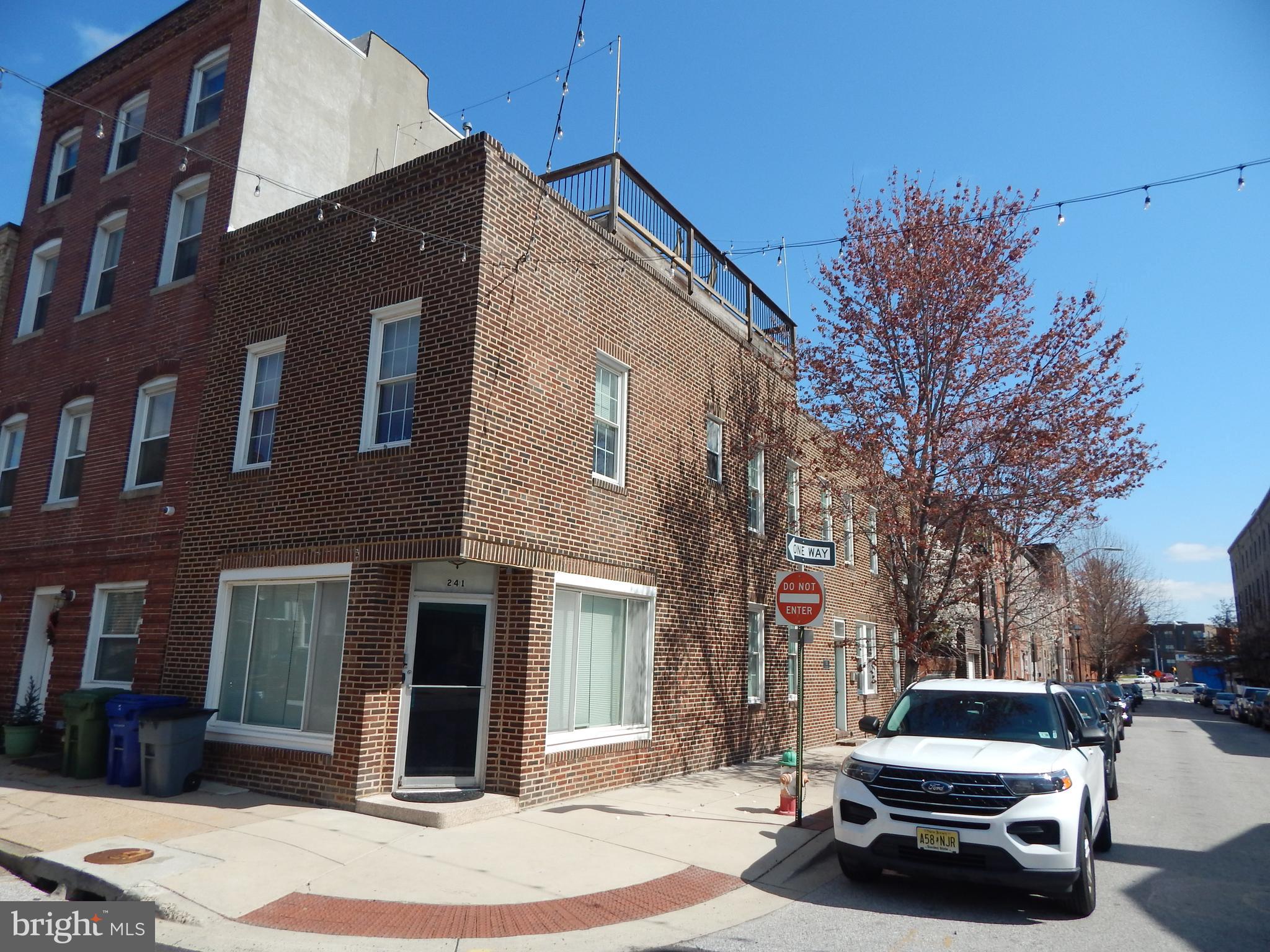 This stunning, 1-Bedroom, 1-Bath ground-floor Apartment is a separate unit from the main house, which is an end-of-group rowhome located in the heart of Little Italy and Harbor East.  Fine dining and bakeries right out your front door. LOCATION, LOCATION, LOCATION. Walking distance to Harbor East, Inner Harbor & Fells Point. This is City living, at its very best! This Apartment has been meticulously renovated and cared for, boasting many original details, including wood floors.   A spacious living room with floor-to-ceiling windows lets in plenty of natural light.  You can see the entire skyline from here, and it is spectacular, especially at night. Enjoy cocktails in the evening as you gaze upon the city lights. Beautiful! This apartment home is a rare find.  Once you visit, you will call it home!