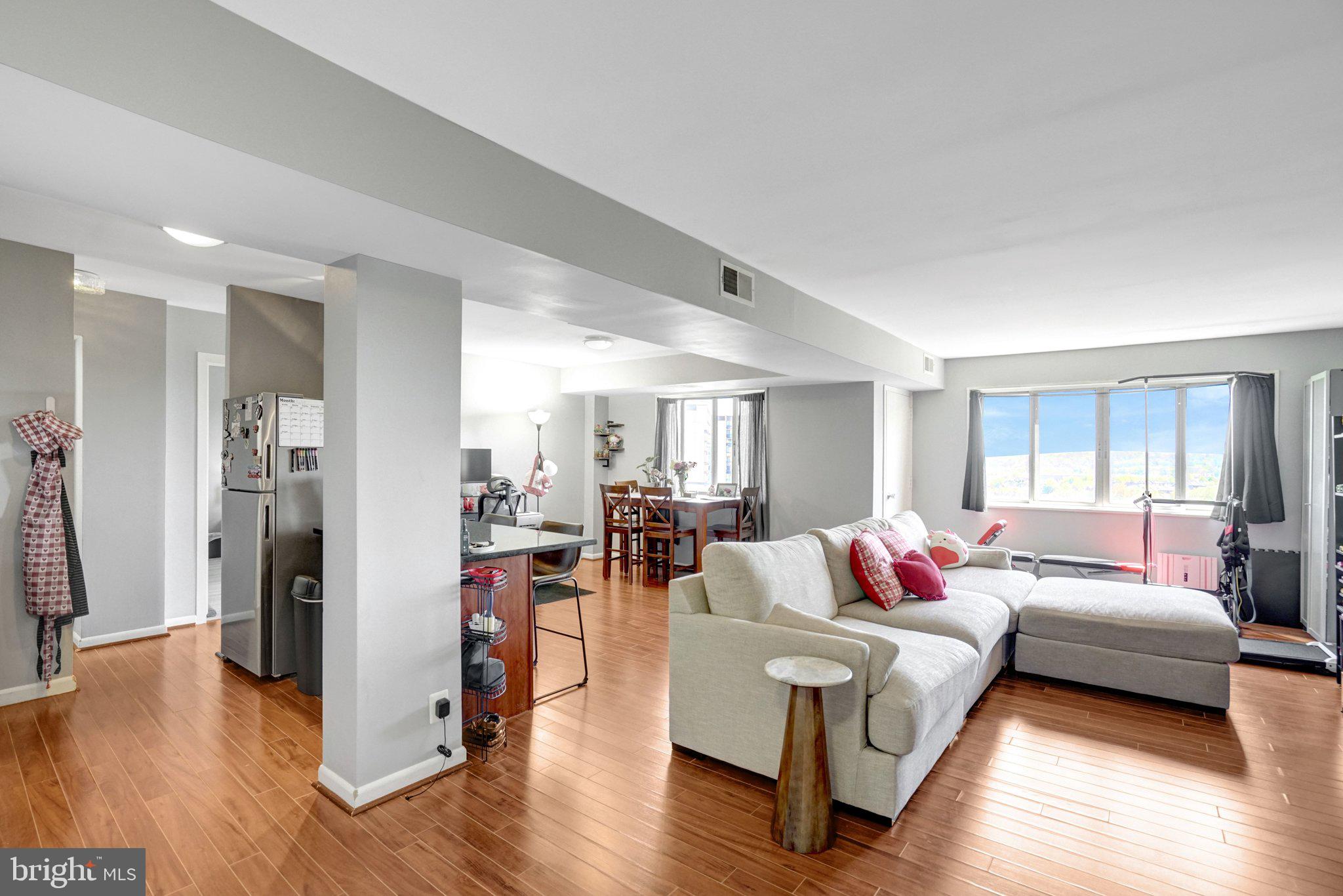 ALL UTILITIES INCLUDED! Experience effortless living in this sun-soaked 1-bedroom, 1-bathroom condo at Pavilion on the Park. This move-in-ready unit features an in-unit washer and dryer and a private balcony, ideal for morning coffee or evening relaxation.

Enjoy a bright, open floor plan with oversized windows. The versatile living-dining area easily adapts to personal style. The kitchen features granite countertops, a breakfast bar, and an updated stainless-steel stove and refrigerator. The spacious bedroom and walk-in closet have been refreshed with premium luxury laminate flooring.

The all-inclusive condo fee covers all utilities, amenities, and building maintenance. Residents enjoy a premium amenity package that includes an outdoor pool, fitness center, sauna, grilling area, party room, bike storage, and car-washing station. Outdoor enthusiasts benefit from direct access to the scenic Holmes Run Trail. The location is just minutes from Old Town Alexandria and only two miles from the Van Dorn Metro, making it a commuter's dream. Bus stops are steps from the front door, and I-395/495 is easily accessible, making quick trips to DC, the Pentagon, or Arlington easy. Residents enjoy unassigned, open parking and a concierge service desk—welcome home!