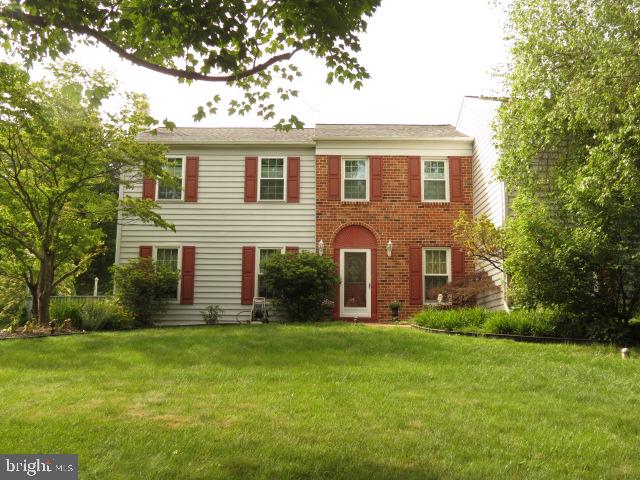 Nestled in the charming Blue Bell Crossing community, this stunning Colonial-style home offers a perfect blend of comfort and modern living. With 4 spacious bedrooms and 2.5 bathrooms, this residence boasts a generous 3,066 sq. ft. of thoughtfully designed space, ideal for both relaxation and entertaining. The sellers are the original owners since it was first built in 1986. Step inside to discover a warm and inviting interior featuring a cozy family room with a brick fireplace, perfect for gathering on chilly evenings. The well-appointed kitchen includes modern appliances such as a built-in microwave, gas range, and dishwasher, complemented by a delightful breakfast area. Recessed lighting and ceiling fans enhance the ambiance throughout the home. Enjoy the convenience of a main-floor laundry and a luxurious master bathroom with both a walk-in shower and a tub shower. The expansive 0.74-acre lot provides ample outdoor space for activities and relaxation, while the attached garage and concrete driveway offer plenty of parking. An addition was built in 2002, which can remain a sumptuous home office or be converted into an additional bedroom. This property is not just a house; it's a place to create lasting memories.