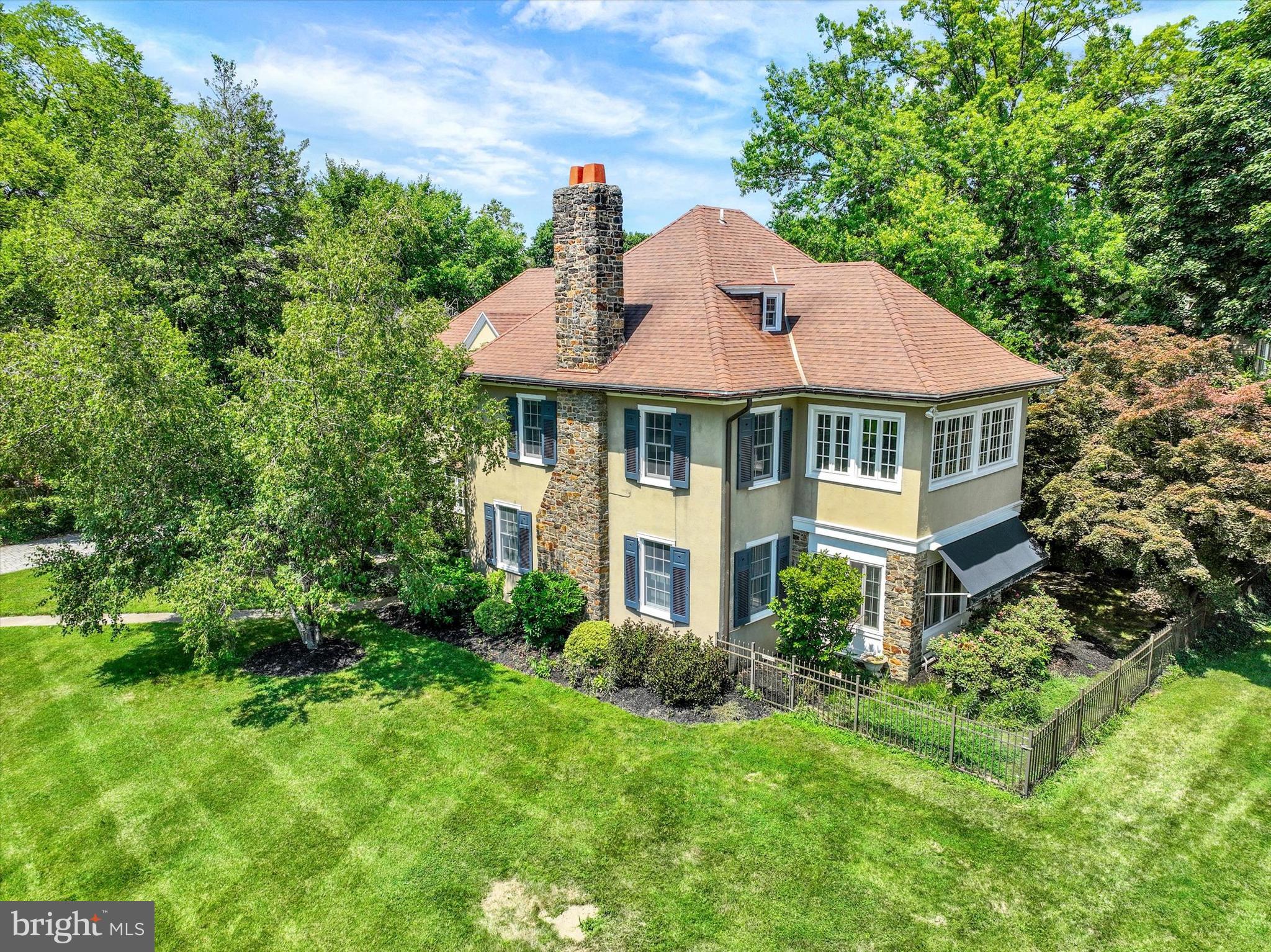 Here's your opportunity to own a hidden gem in the crown of Springdale! This house occupies a double corner lot in this architecturally significant neighborhood. The living room is flooded with light from every direction and features a gas fireplace and an abundance of built-ins. The dining room is bright from the large window that over looks the gardens. This room flows to and from the living room and sunroom. The library is cozy and is surrounded by built-ins. The kitchen is well appointed with an overabundance of cabinets including a beverage sink & refrigerator. The large window over the sink provides wonderful sunlight and views of the patio and gardens. The primary suite on the second floor features a 27 X 14 ft. bedroom,  two large dressing rooms(one with a wet vanity), two full baths and a sitting room with windows on three sides. Plus its own laundry.  There's a second bedroom with an ensuite bath with heated floors. Two additional bedrooms sharing a Jack & Jill bath can be found on this level also.  A large 29 X 22 family/bonus room finishes out the second floor.  This area has a laundry and backstairs for a quick return to the first level. The fifth bedroom with an ensuite bath occupies the third floor along with a large storage room. Hardwood floors flow top to bottom throughout the entire house. The back of the house features your own private resort with a 15 X 60 ft. heated salt water concrete & tile pool with an electric retractable pool cover. There's also a separate spa to relax the day and evening away. The rear kitchen door leads to a covered porch which provides access to the utility room. You gain access to the two car garage from this room also. The detached one car garage functions as a pool house and provides additional pool & garden storage. The unfinished basement provides additional storage with exterior egress.