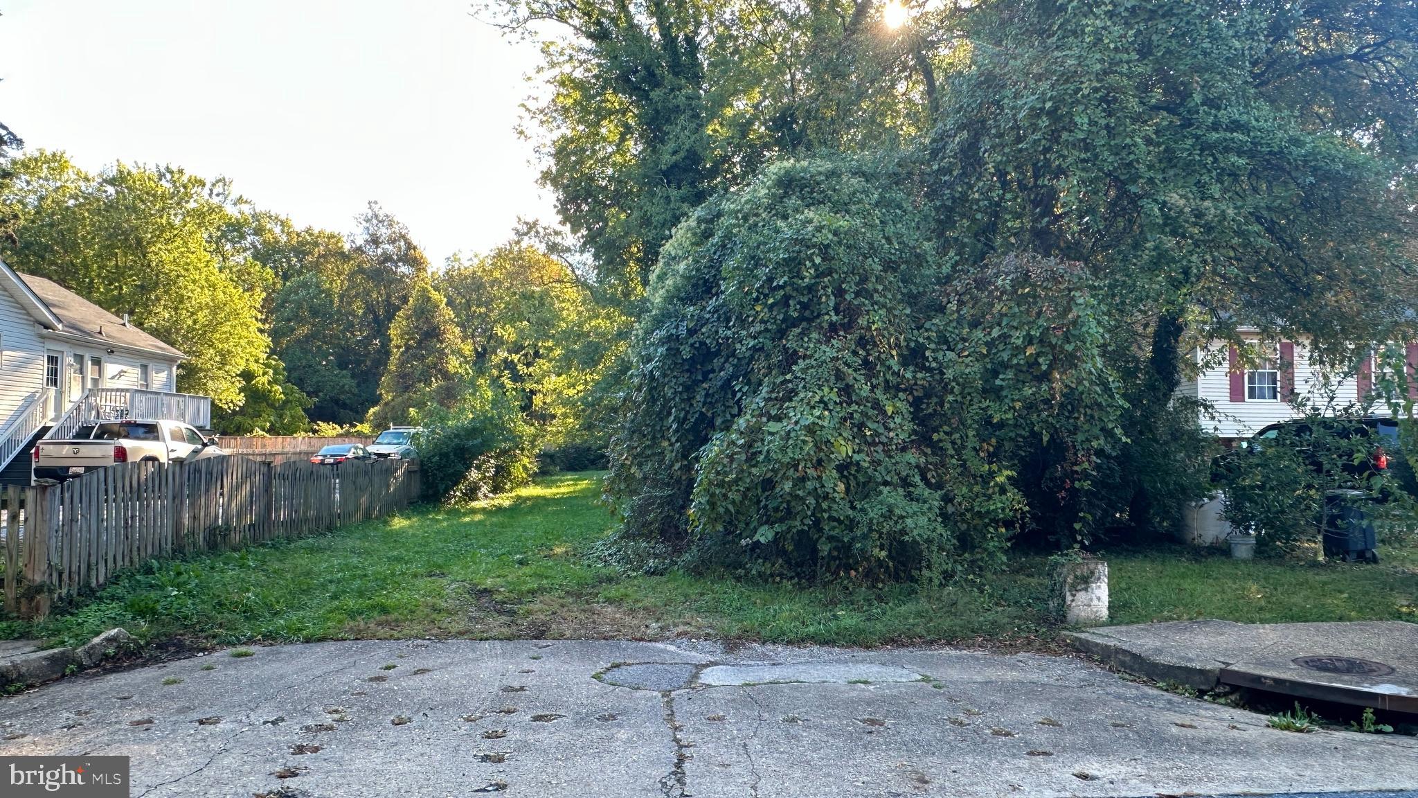 Nestled in the charming City of Riverdale Park, this exceptional flat lot offers a unique blend of tranquility and convenience, all within a vibrant community. Spanning 6,750 square feet, this property is strategically located close to the Route 1 Arts District, yet tucked away on a quiet street that backs onto serene trees and parkland.

 Key Features
- Accessibility: Public water and sewer access is conveniently located on Taylor Street,  approximately 35 yards away, along with electric and gas utilities.
- Proximity to Arts & Nature: The lot is within walking distance of the Hyattsville Arts District and features a bike/footpath trail that winds through the trees, leading to Lake Artemesia to the north and Washington, D.C. to the south.
- Educational Institutions: The renowned University of Maryland is a short walk or bike ride away, making this an ideal location for students and faculty alike.
- Convenient Amenities: A shopping center with a gym and various restaurants, anchored by Whole Foods is only a 5-minute drive away.
- Transportation Access: Enjoy quick access to major roads including Route 1, East-West Highway, Route 50, and Kenilworth Avenue. The MARC Camden-Washington commuter train station is also within walking distance, providing easy connectivity between Union Station and Baltimore.

 Opportunity for Development
The seller had previously drawn up plans for a house on this lot but, due to time constraints, never moved forward with construction. These plans are available in the disclosures, offering a head start for prospective buyers looking to build their dream home in this fantastic location.

This lot is a wonderful opportunity for nature lovers who wish to be close to the vibrant happenings of the Arts District while enjoying the peace and serenity of a quieter neighborhood. Don’t miss your chance to make this desirable property your own at a reasonable cost!

If you have any questions or would like to schedule a visit, feel free to reach out!