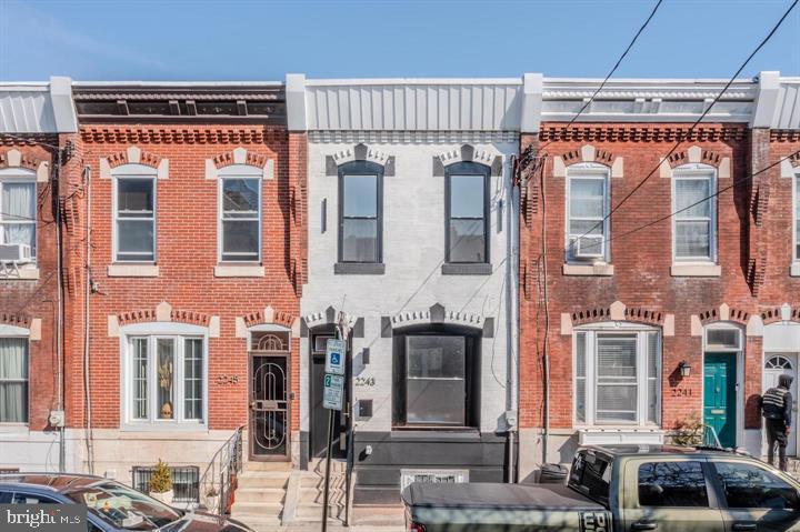 Welcome to 2243 Dickinson Street, a beautifully designed home in the heart of Point Breeze offering 3 bedrooms, 2.5 bathrooms, and a thoughtfully finished layout with modern style and high-quality details throughout. The bright and inviting first floor features a striking staircase accent wall, a convenient powder room, and a beautifully appointed kitchen with waterfall countertops, premium appliances, and a clean, modern design that blends style and function. Upstairs, you’ll find three bedrooms and two full bathrooms, all finished with exceptional attention to detail and quality craftsmanship. Throughout the home, thoughtful design choices and refined finishes create a polished, move-in-ready feel. Located within walking distance of Wharton Square Park and close to some of Point Breeze’s most popular restaurants and bars, including Dock Street Brewing, American Sardine Bar, and Hardena, this home offers the perfect mix of modern comfort and neighborhood convenience. 2243 Dickinson Street is ideal for buyers seeking a thoughtful, modern, and well-finished home in one of South Philadelphia’s most desirable neighborhoods. Schedule your tour today. The sale is contingent on short sale approval. The bank has been responding reasonably and in the early stages of the foreclosure process.
