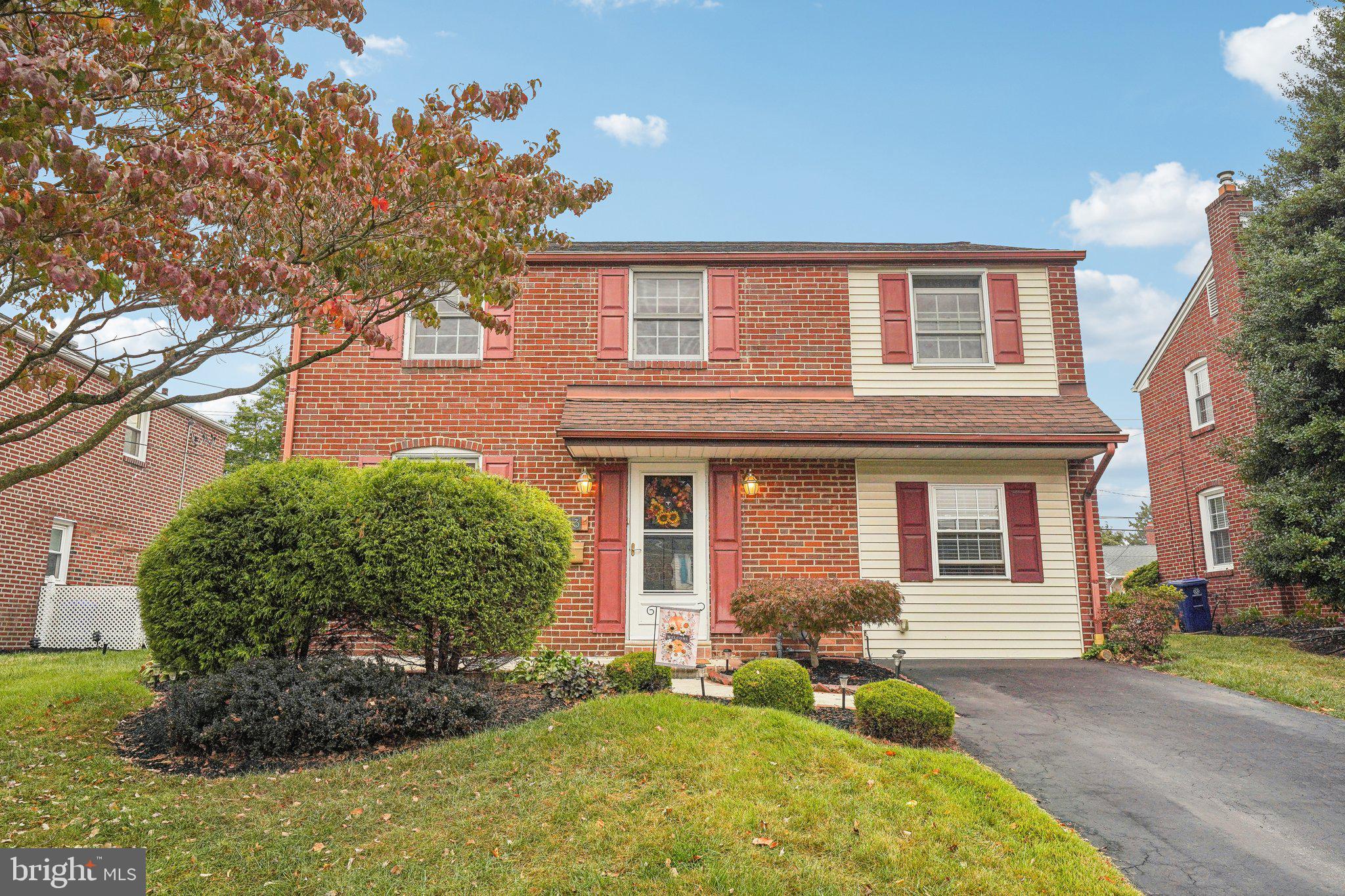 Welcome home to this beautifully expanded 3 bedroom brick colonial in top rated Haverford schools! Hardwood floorings welcomes you as you enter through the front door into the bright and airy living room featuring large windows that flood the space with natural light. The formal dining room includes charming built-in corner cabinets, adding a touch of character. The spacious kitchen, the true heart of the home, boasts an abundance of cherry cabinetry, generous granite countertop space and stainless steel appliances. The cheerful breakfast room is part of a fantastic addition that also includes a large family room with a bay window offering a view of the backyard, plus a convenient powder room. The large kitchen and family room addition provide ample space for hosting family and friends. Step outside from here to the expansive, fully fenced backyard with two patios, ideal for summer BBQs and outdoor gatherings. The first floor is completed with  a large storage closet and a cozy den or home office. Upstairs, the primary suite features a walk-in closet along with two additional closets for plenty of storage.  In addition to 2 other bedrooms and a tile hall bathroom with tub/shower combo, you will also find a bonus room on this level that can be used as an office, nursery or even a second laundry area. The finished lower level offers additional living space and includes a separate laundry room. Situated in a wonderful neighborhood close to parks, shopping, dining, and with easy access to major commuter routes, this home offers the perfect balance of comfort and location. Don't miss the opportunity to enjoy everything Havertown and its surrounding suburbs have to offer!