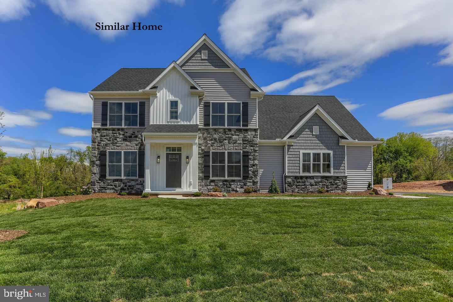 Build this Camden floor plan on 2 acres! It is the perfect blend of architectural elegance and everyday utility in this stunning 4-bedroom, 3.5-bath masterpiece. Boasting over 2,893 sq. ft. of finished living space, this home is designed for those who believe you can never have too much storage—or too much style.  High-end stone accents and a 3-car side-load garage provide a sophisticated profile and plenty of room for vehicles and hobbies.  Step through the foyer and experience an airy, open-concept layout defined by 9' ceilings on the main floor.  Whether you’re hosting in the expansive Great Room or utilizing the versatile flex space for a home office or formal den, this home adapts to your lifestyle.  Key Features that you will love about this plan. A Closet for Everyone: Say goodbye to storage wars! Every single bedroom features its own dedicated walk-in closet.  The Owner’s Retreat: A true sanctuary featuring a spa-inspired ensuite with a stand-alone soaking tub, separate glass shower, and a massive walk-in closet.  The "Teen Suite": A thoughtfully designed bedroom layout with an ensuite that offers privacy and independence for older children or long-term guests.  The upper floor oversized laundry room is super convenient for all your laundry needs.  This lot is exclusively offered by Phil Carpenter Custom Homes, a premier custom home builder in the area. They offer various home plans or can assist in designing a custom home on this 2-acre property, conveniently located near I-83 and the MD/PA state line.  The list price is the starting price to build the Camden floor plan on this lot.  Contact listing agent for more details.