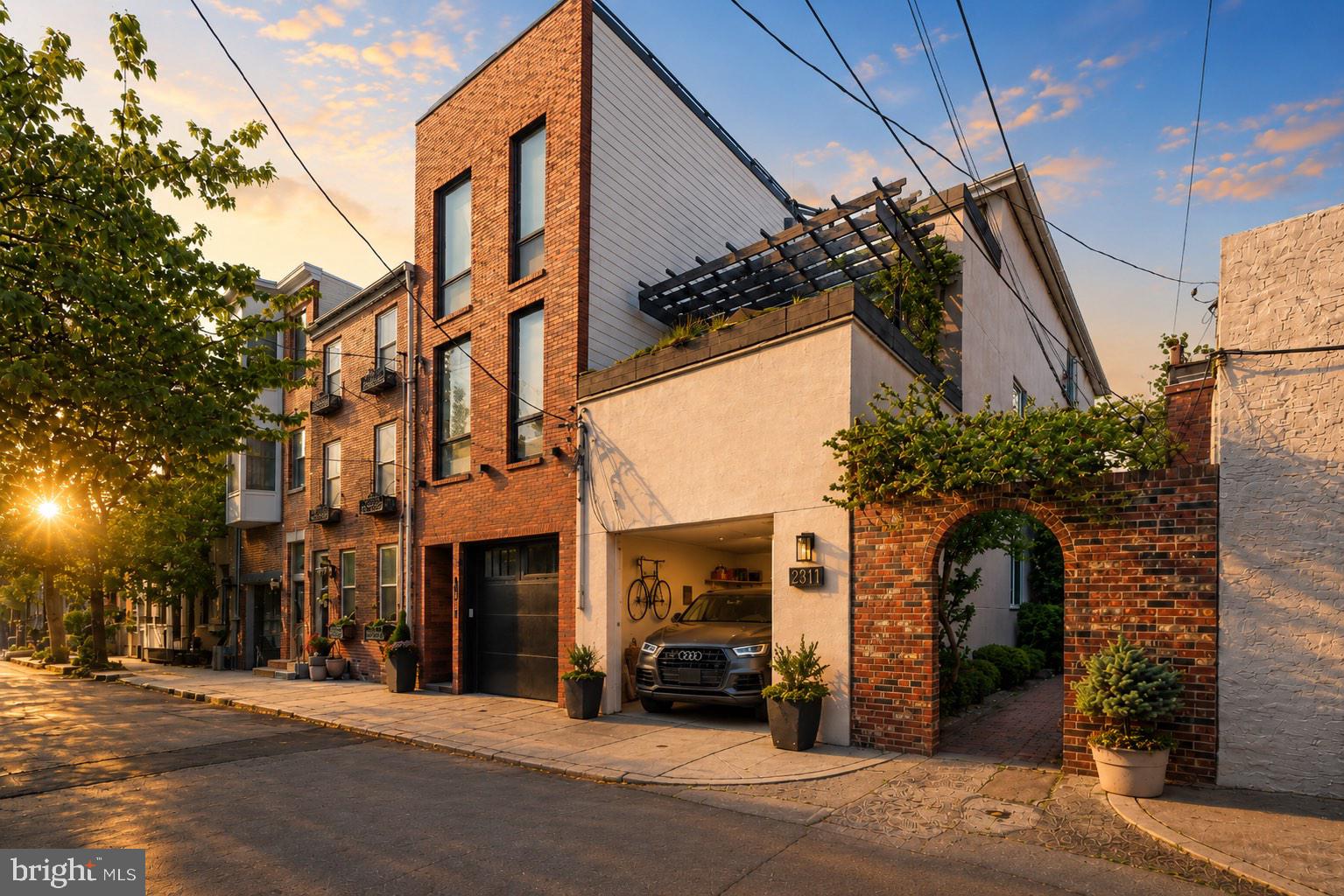 End-of-row on one of Fairmount’s most desirable blocks, this exceptional home offers the perfect combination of location, space, and everyday convenience.  Positioned just steps from neighborhood favorites, this is truly a prime setting within the Art Museum area—picturesque, established, and highly sought after, with the added charm of historic Pig’s Alley just outside your door.  Spanning over 2,800 square feet, the home features four bedrooms, two full bathrooms, and one half bath, with a layout designed for both comfortable living and easy entertaining.   As an end-of-row property, it benefits from additional windows and abundant natural light throughout, creating a bright, open feel on every level.  The home offers a thoughtful flow with generous room sizes, multiple living spaces, great ceiling height, and a private entrance that adds to its sense of exclusivity.  Two private balconies provide ideal outdoor retreats, perfect for morning coffee or unwinding at the end of the day.  One of the most valuable features is the private garage parking—an increasingly rare convenience in the neighborhood.  Arrive home and pull directly into your garage without the need to search for parking, then start your day with your car exactly where you left it.  With its combination of size, light, outdoor space, parking, and location—all in a premier Fairmount setting—this home presents a unique opportunity.  Move-in ready and easy to enjoy, this is city living at its best!