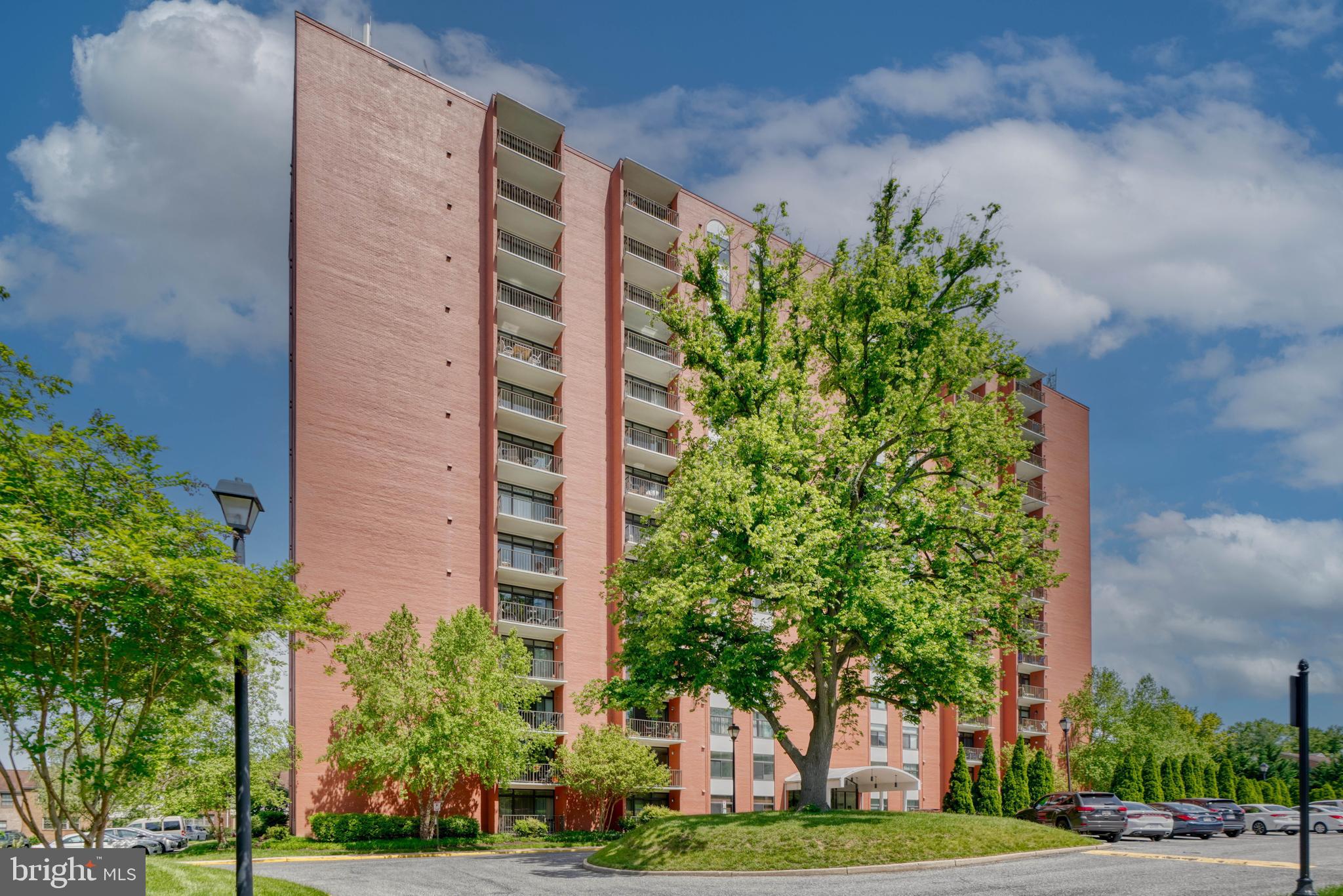 Rare opportunity in Dulaney Towers!  This fully renovated corner unit offers light-filled spacious living with sweeping views that truly deliver a “wow” factor. As one of the largest units in the building, the extra windows flood each room with natural light and offer beautiful views from each window.  There is an abundance of closet and storage space throughout, including a bonus storage space just down the hall.  Beautiful engineered hardwood plank flooring throughout the unit adds warmth and continuity.  
The expanded, fully renovated kitchen provides an abundance of counterspace, stainless steel appliances, under cabinet & recessed lighting and granite countertops with a sleek Israeli tile backsplash.  It opens seamlessly to the dining area and a spacious, comfortable living room, where sliding glass doors lead to a private balcony with incredible east-facing views over Towson.   There are 2 generously sized bedrooms  and two tastefully updated bathrooms. The primary suite includes a walk-in closet and en-suite bath, while the second bedroom offers flexibility for guests, office, or additional living space.  In unit laundry is available with new washer and dryer (2022) and  all windows and sliding glass door have been replaced.
Peaceful and private, yet perfectly positioned for convenience, this home is just moments from I-695 and easily walkable to Towson’s shops, dining, and everyday essentials.
 Dulaney Towers provides a host of amenities including a gated entrance, pickleball and tennis courts, and a community pool—all with utilities (water, electricity, heat and AC) included in the monthly condo fee. Enjoy effortless, low-maintenance living in Towson.  
PLEASE NOTE-  condominium association DOES NOT allow dogs or rentals