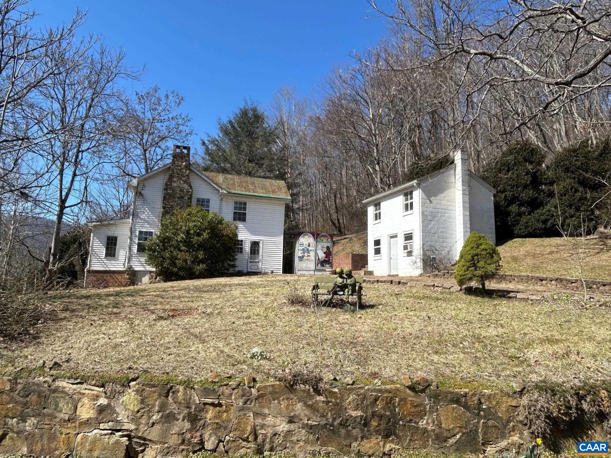 Our Circa 1891 home, just a few minutes�from the parkway and Lydia Mountain, has been a Post Office, a residence for many, an�air B&B�and a showroom�for local crafts. We have a new well and are looking for a buyer to appreciate the 3 bedroom, 2.5 bath, 1634 sf home on 1.1 acres. The rooms are now mostly empty. There is a metal�roof, oak floors, insulated windows, a propane fireplace,�window a/c, a gurgling stream��and a 2 level workshop. Its a cash only proposition and around 100k below recent tax assessment,Formica Counter,Painted Cabinets,White Cabinets,Wood Cabinets,Fireplace in Living Room